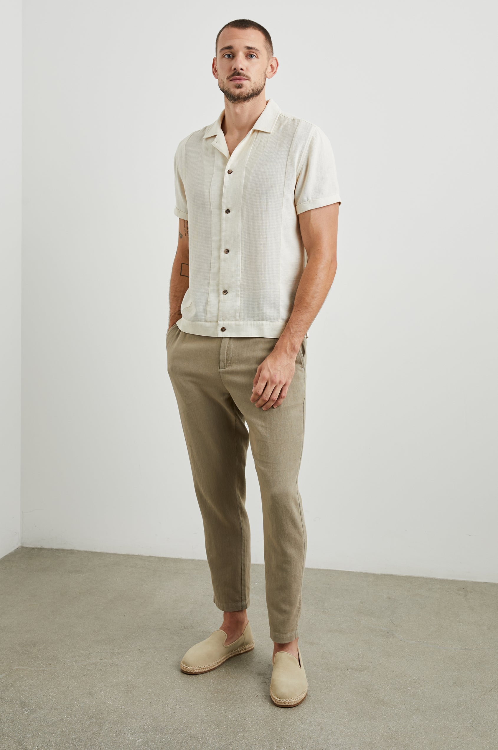 Duke Short Sleeve Button Up with Rolled Cuffs and in Parchment Wheat Colorway, Alternating Vertical Panels of Wheat and Parchment - Front Full Body View Featured on Model
