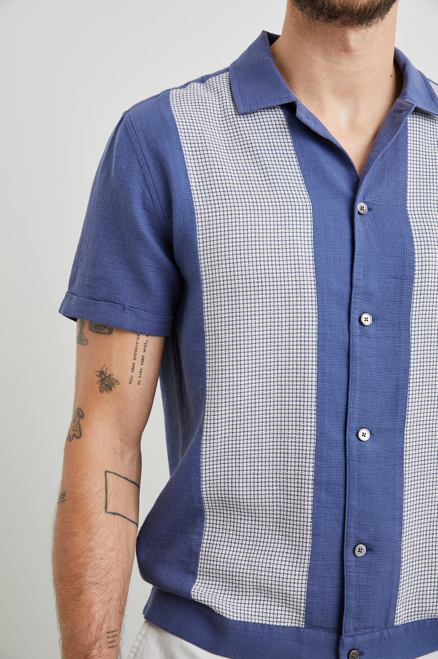 Duke Short Sleeve Button Up with Rolled Cuffs and in Royal Parchment Colorway, Alternating Vertical Panels of Blue and Parchment - Front View Featured on Model