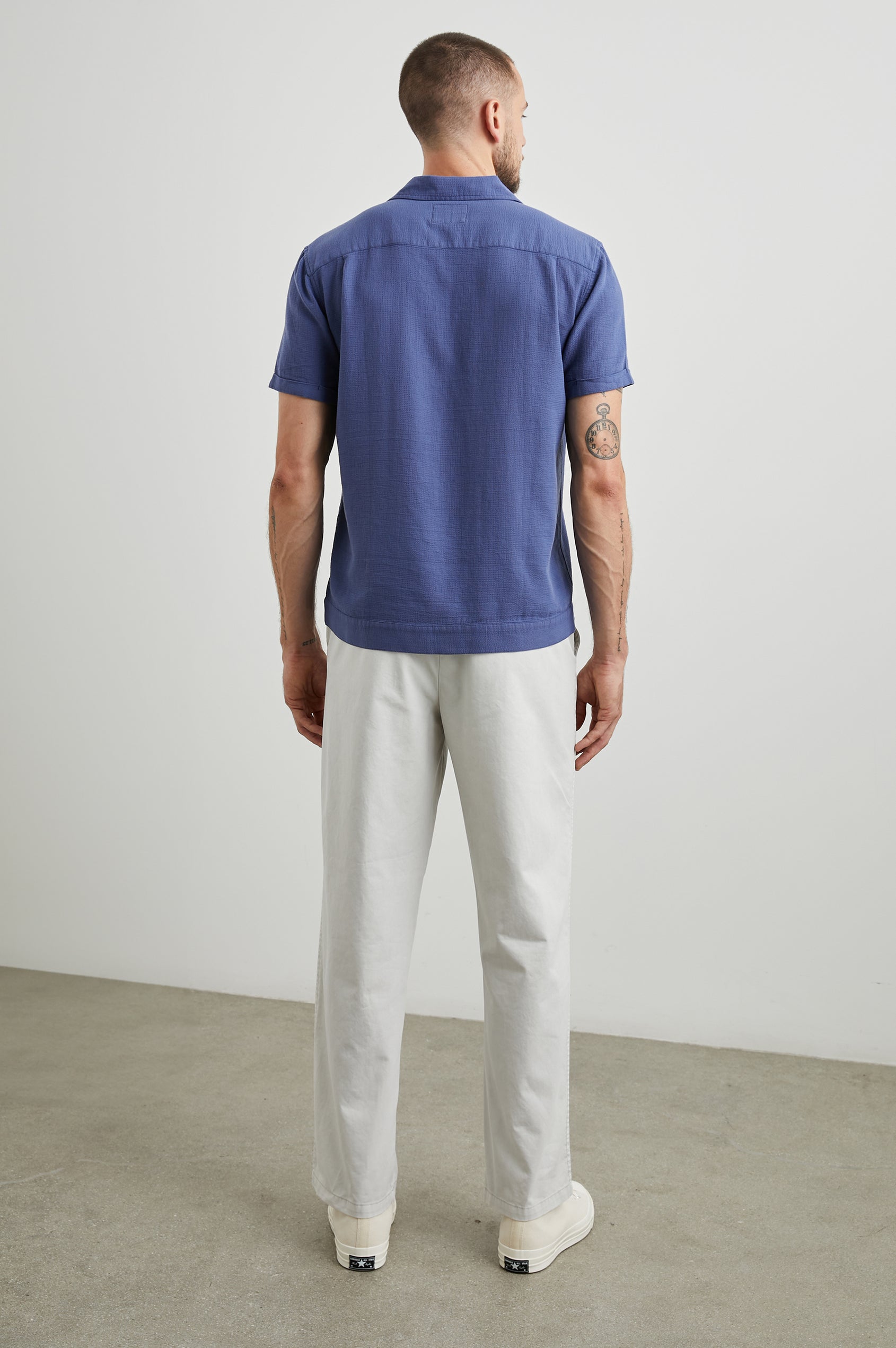 Duke Short Sleeve Button Up with Rolled Cuffs and in Royal Parchment Colorway, Alternating Vertical Panels of Blue and Parchment - Back Full Body View Featured on Model