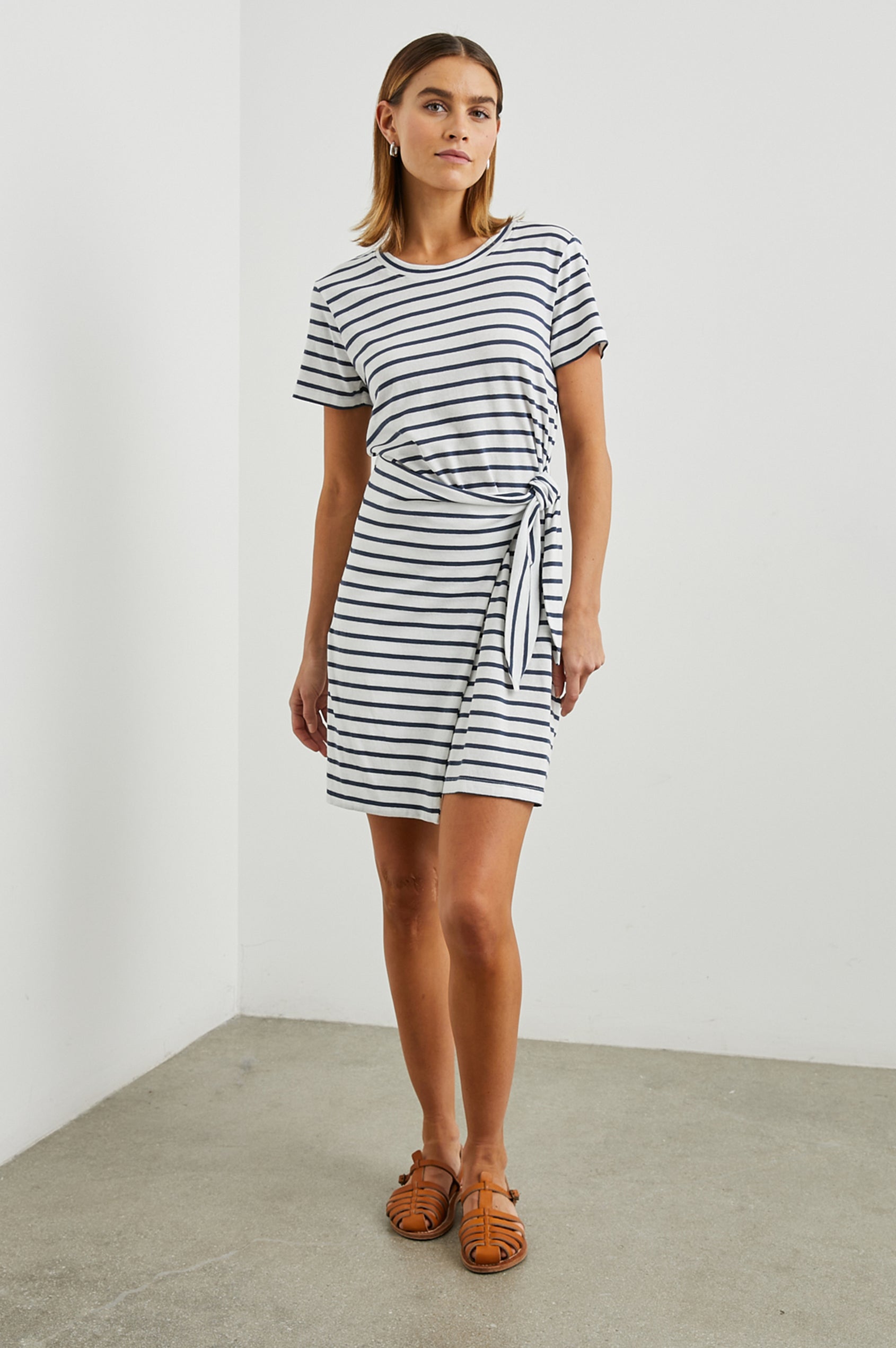 Edie Above-Knee Dress with Short Sleeves, Crew Neckline and Adjustable Wrap Tie At Waist in Ivory Navy Stripe Colorway, Horizontal Stripes - Front Full Body View Featured on Model