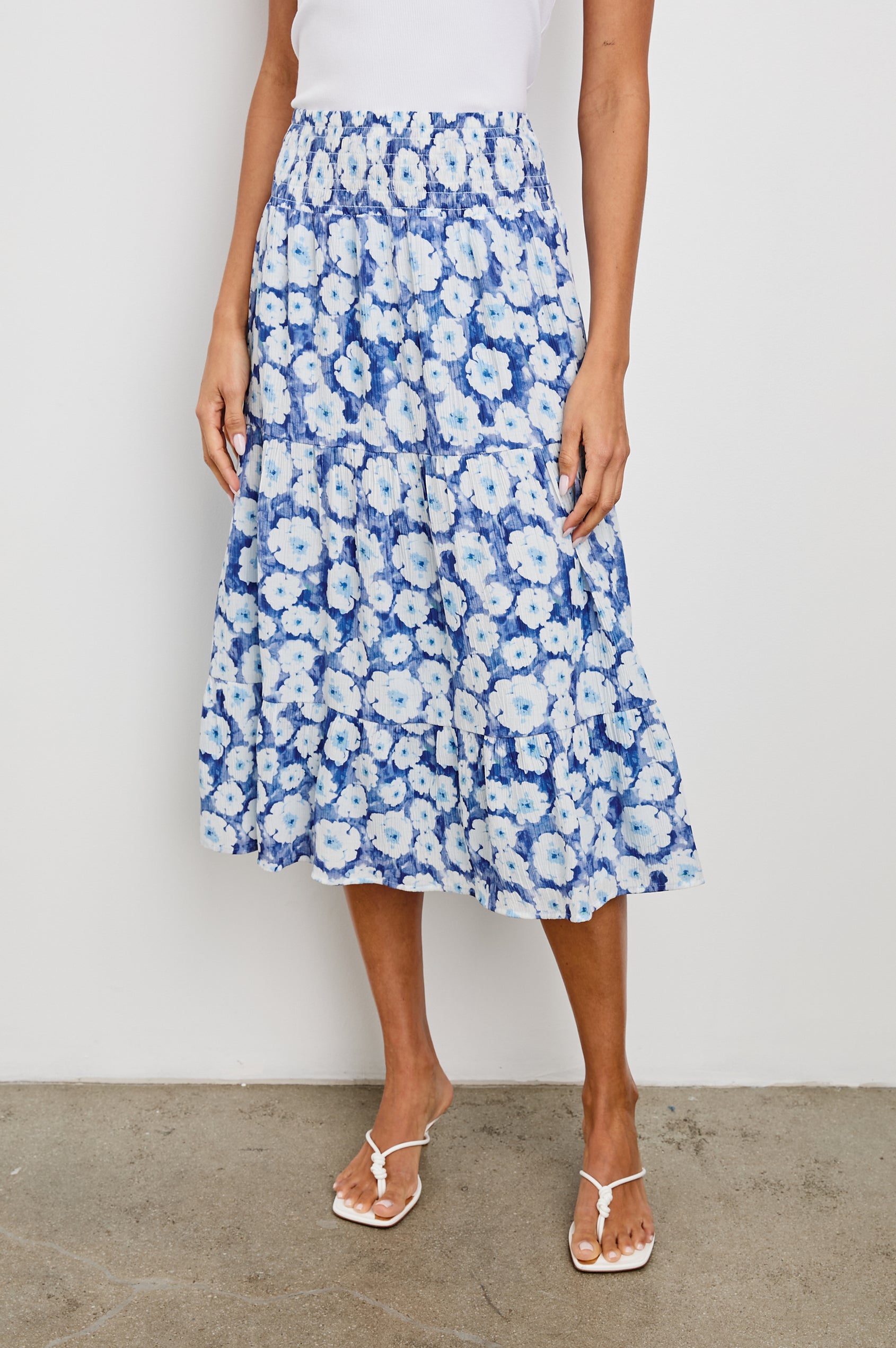 Edina Tiered Midi Skirt with Shirred High-Rise Waistline in Blue Floral Colorway, Blues and White - Front View Featured on Model