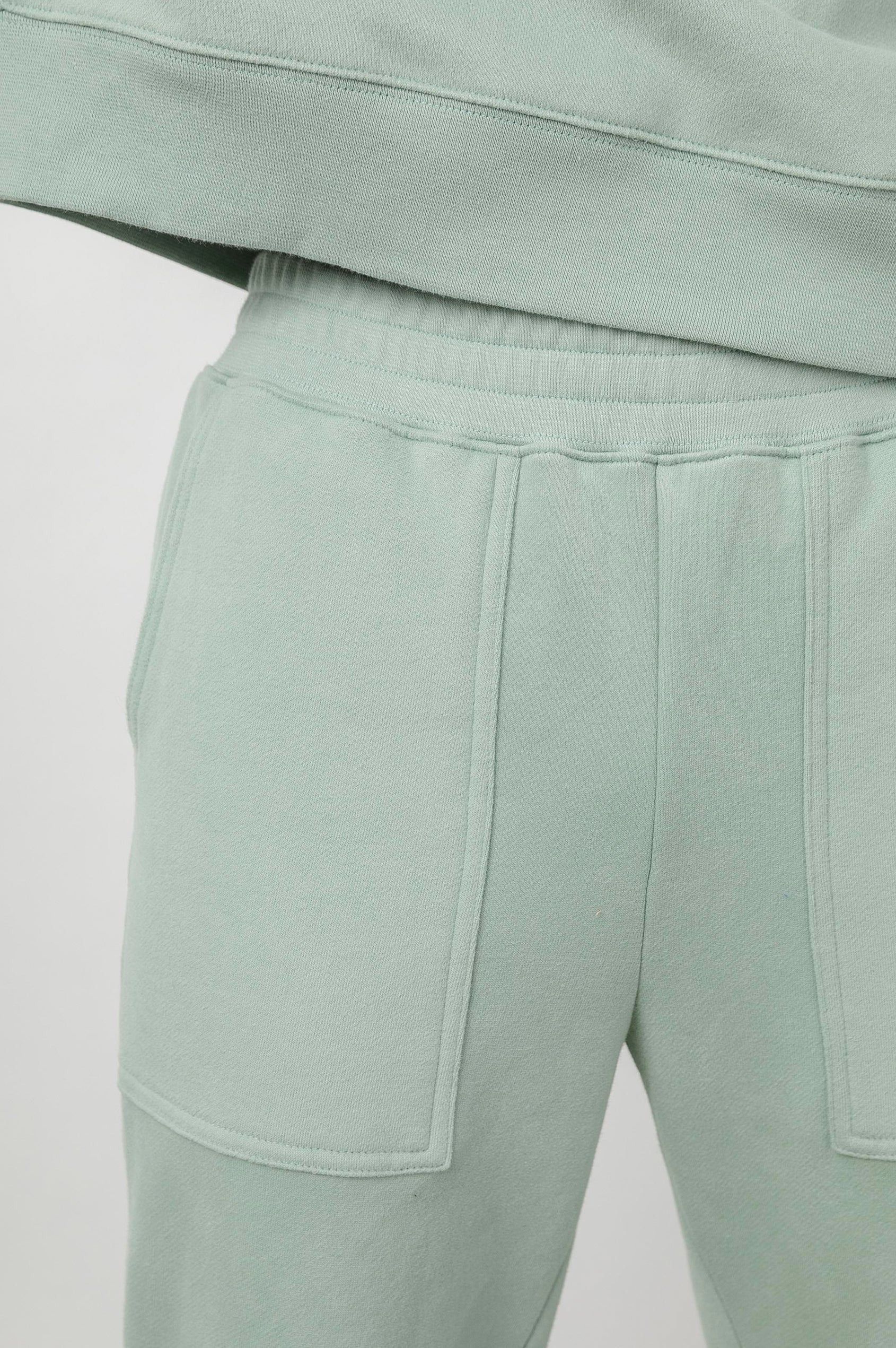 Nico & Edna Set with a Sweatshirt with a Hood and Pants with Two Large Front Pockets and One Back Patch Pocket in Light Seafoam Colorway - Front View Featured on Model 