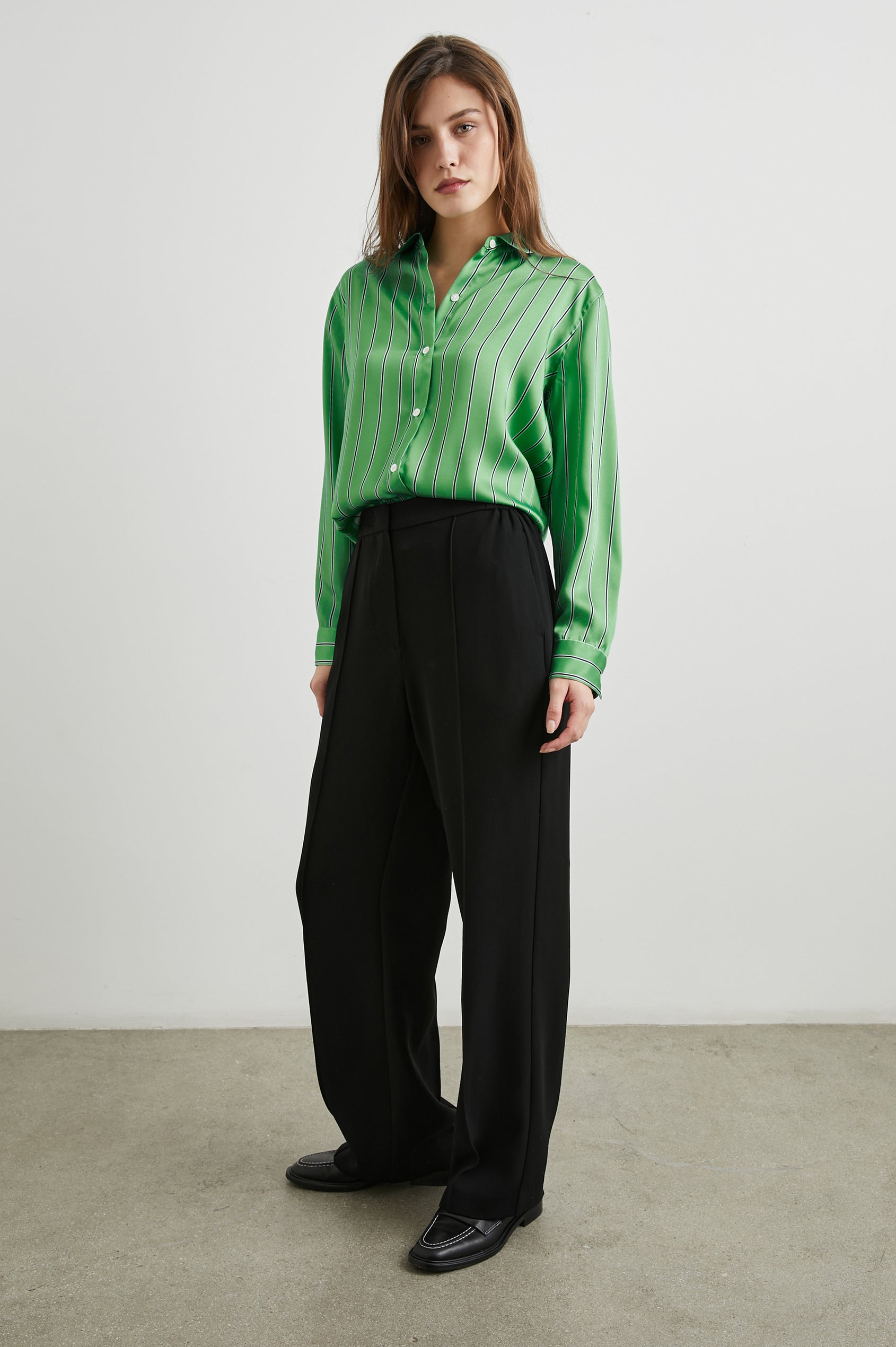 Elias Long Sleeve Button Up in Basil Stripe Colorway, White and Black Vertical Stripes on Basil - Front Full Body View Featured on Model
