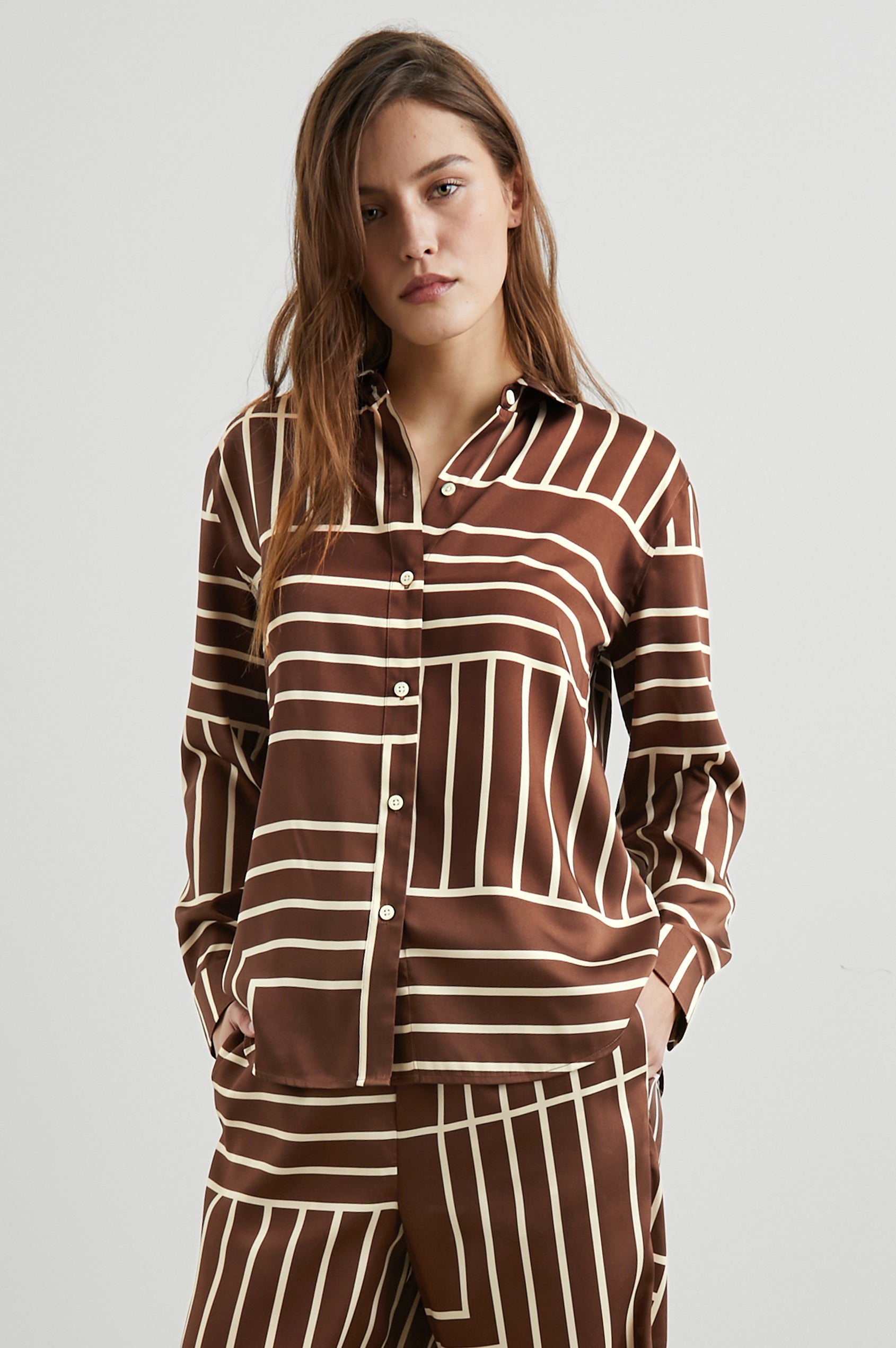 Elias Long Sleeve Button Up in Brown Line Art Colorway, Vertical and Horizontal White Lines on Brown - Front View Featured on Model