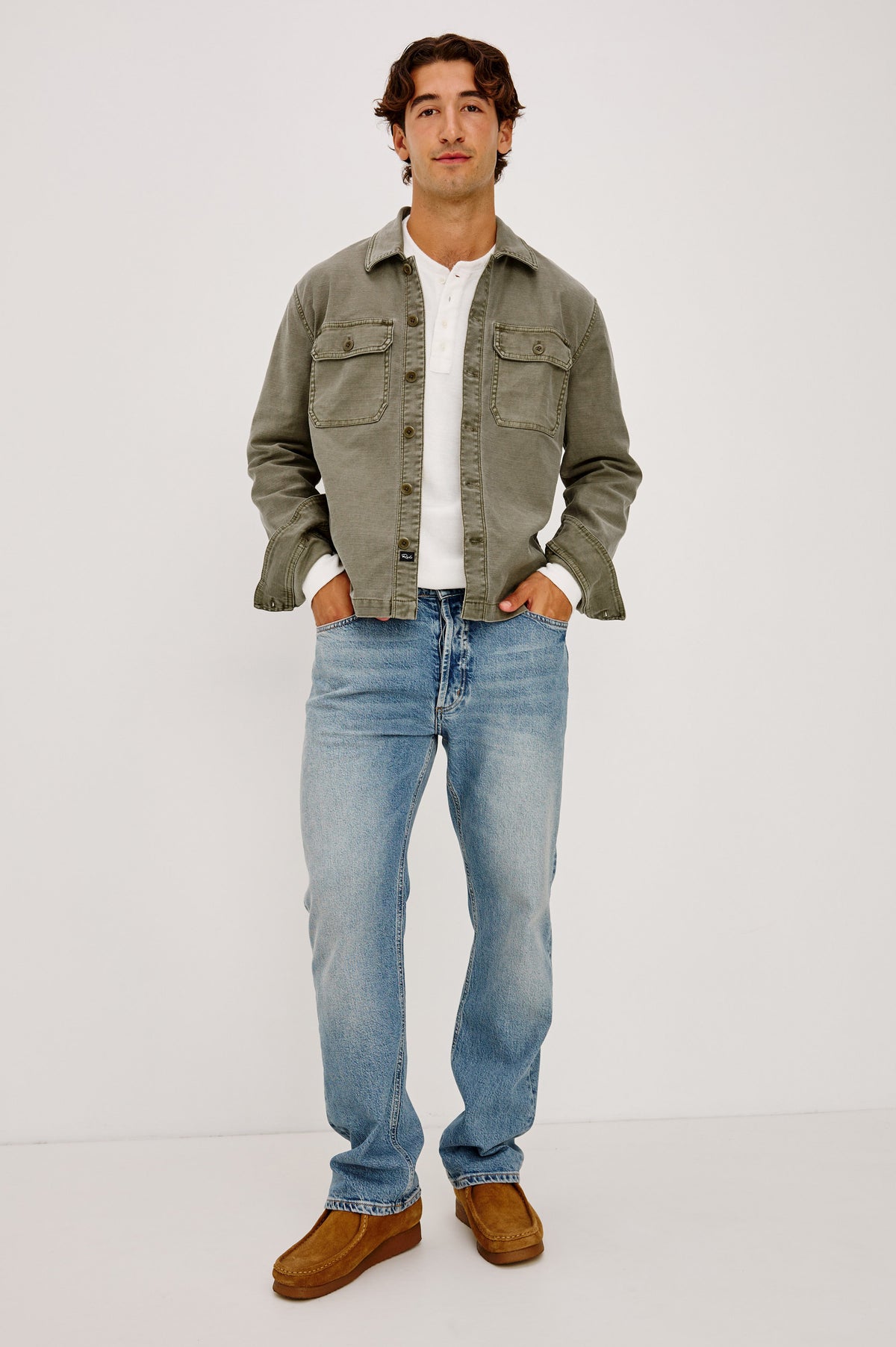 Eliot Jacket in Cotton Twill With Front Button Placket, Chest Flap Pockets, Point Collar, and Long Sleeves in Terra Colorway - Full Body Front View Featured on Model.