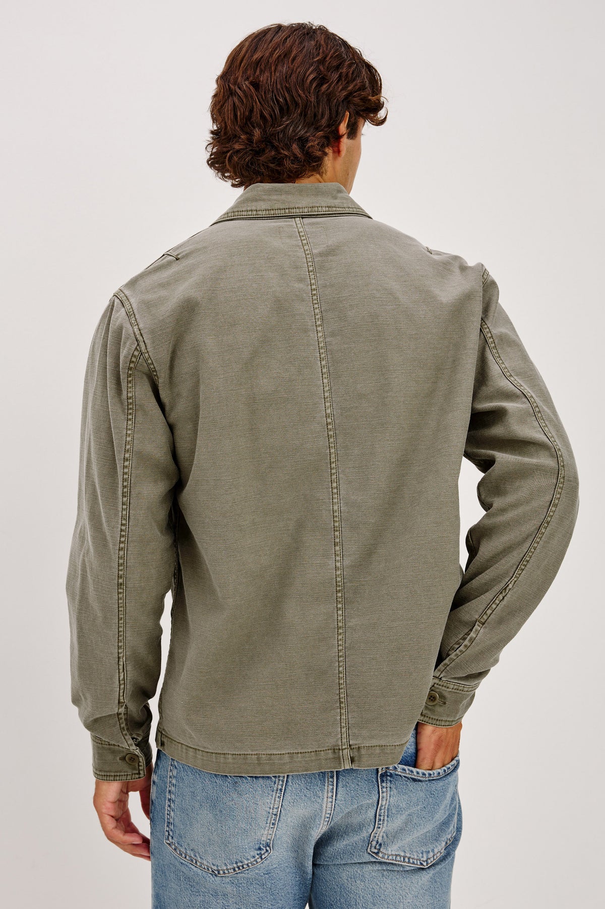 Eliot Jacket in Cotton Twill With Front Button Placket, Chest Flap Pockets, Point Collar, and Long Sleeves in Terra Colorway - Upper Body Back View Featured on Model.