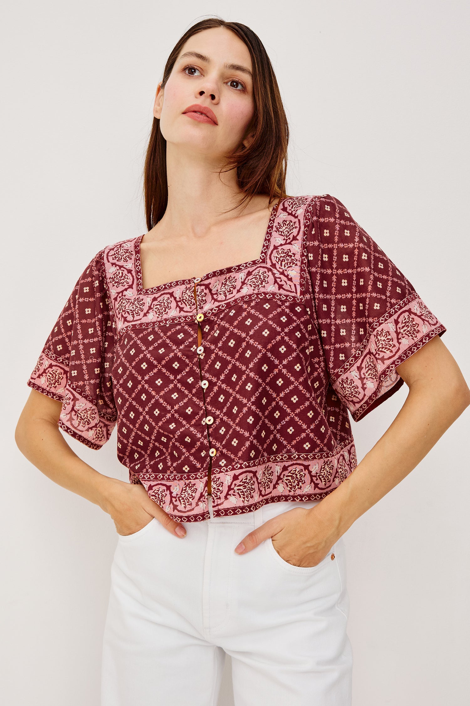 Ellen Cropped Cotton Shirt With Square Neckline Cropped Boxy Silhouette Front Buttons and Flared Short Sleeves in Flower Chain Colorway - Upper Body Front View Featured on Model