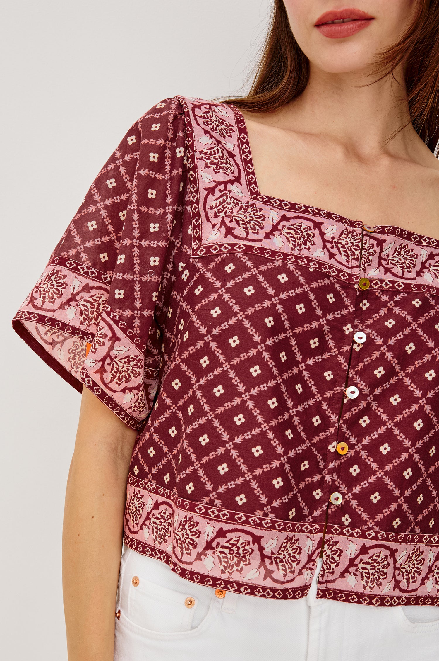 Ellen Cropped Cotton Shirt With Square Neckline Cropped Boxy Silhouette Front Buttons and Flared Short Sleeves in Flower Chain Colorway - Upper Body Front View Featured on Model