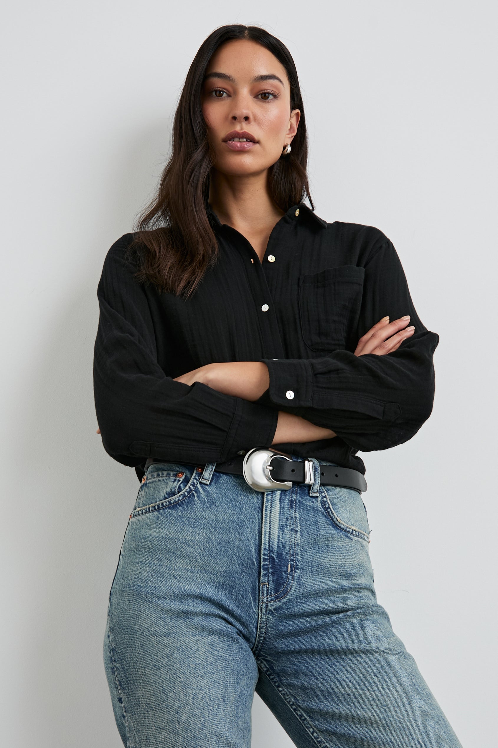 Ellis Long-Sleeve Button Down with Cuffs and a Front Chest Pocket in Black Colorway - Front tucked View Featured on Model