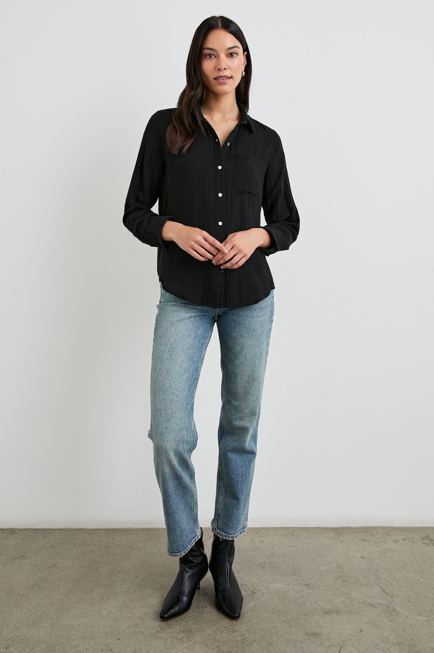 Ellis Long-Sleeve Button Down with Cuffs and a Front Chest Pocket in Black Colorway - Front Untucked Full Body View Featured on Model