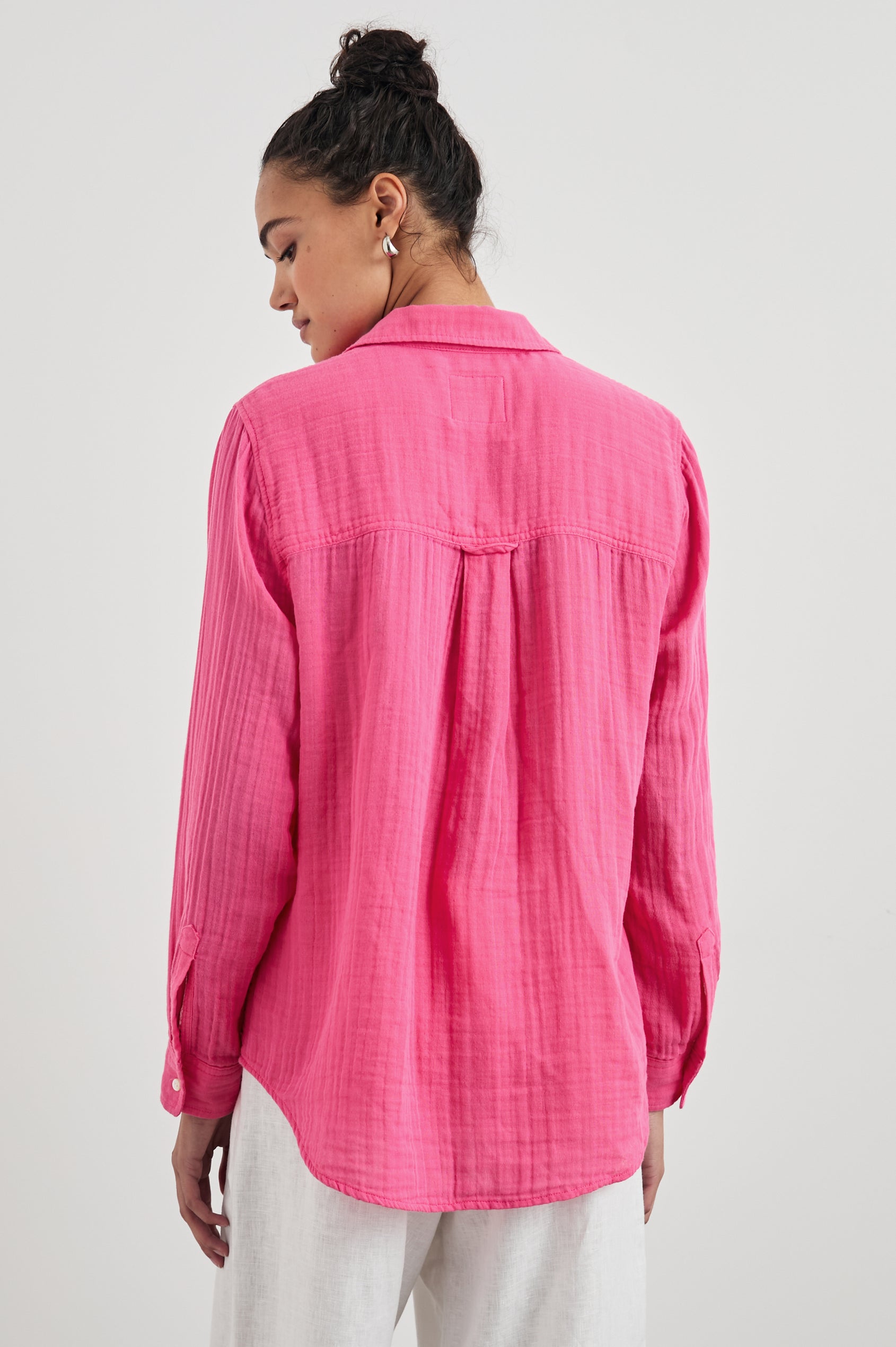 Ellis Long-Sleeve Button Down with Cuffs and a Patch Chest Pocket in Hibiscus Colorway - Back Untucked View Featured on Model