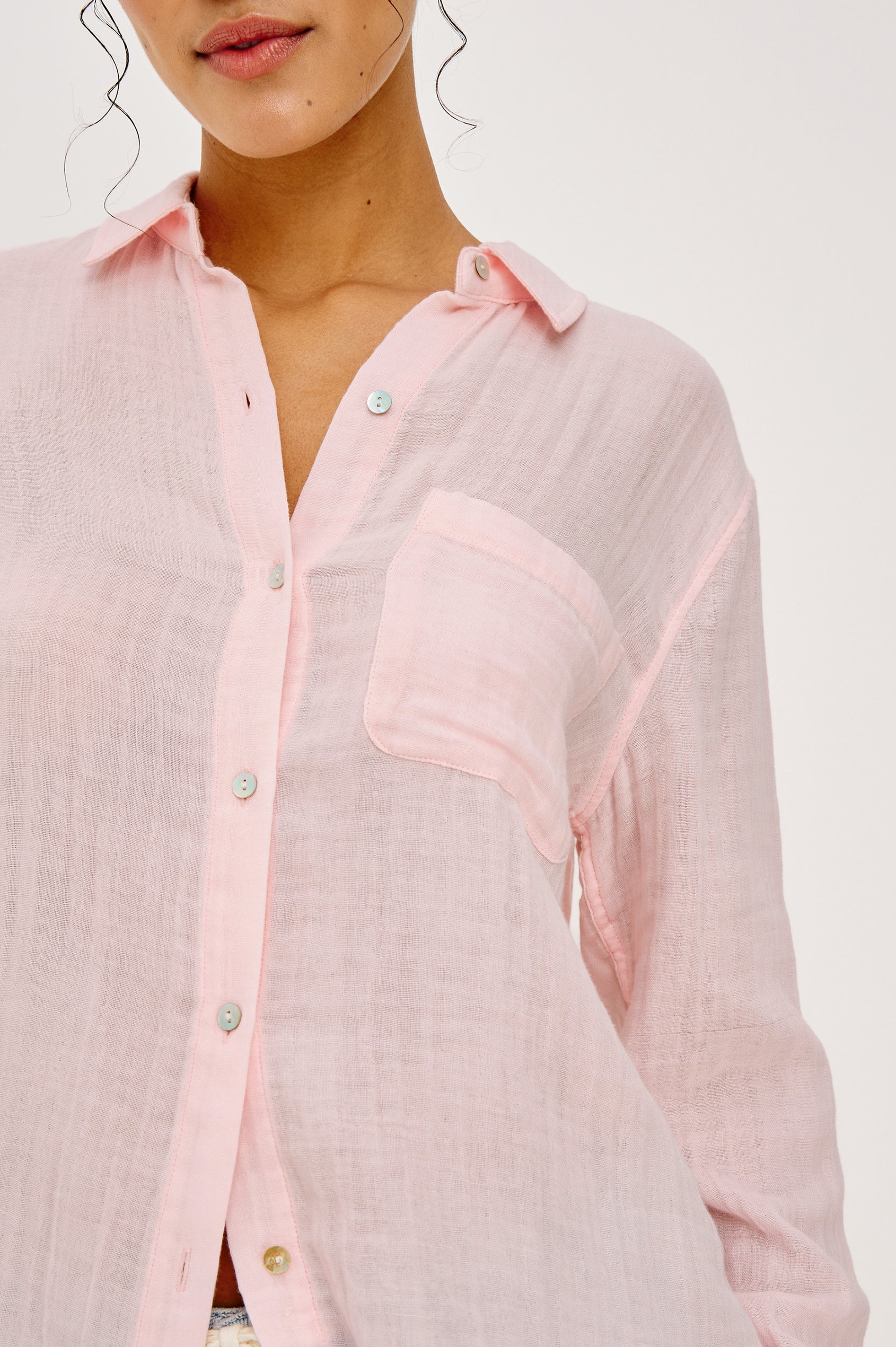 Ellis Relaxed Collared Button Front Shirt with Long Sleeves and a Chest Pocket in Baby Pink Colorway. Full Body Front View Details Zoomed In Shown on Model.