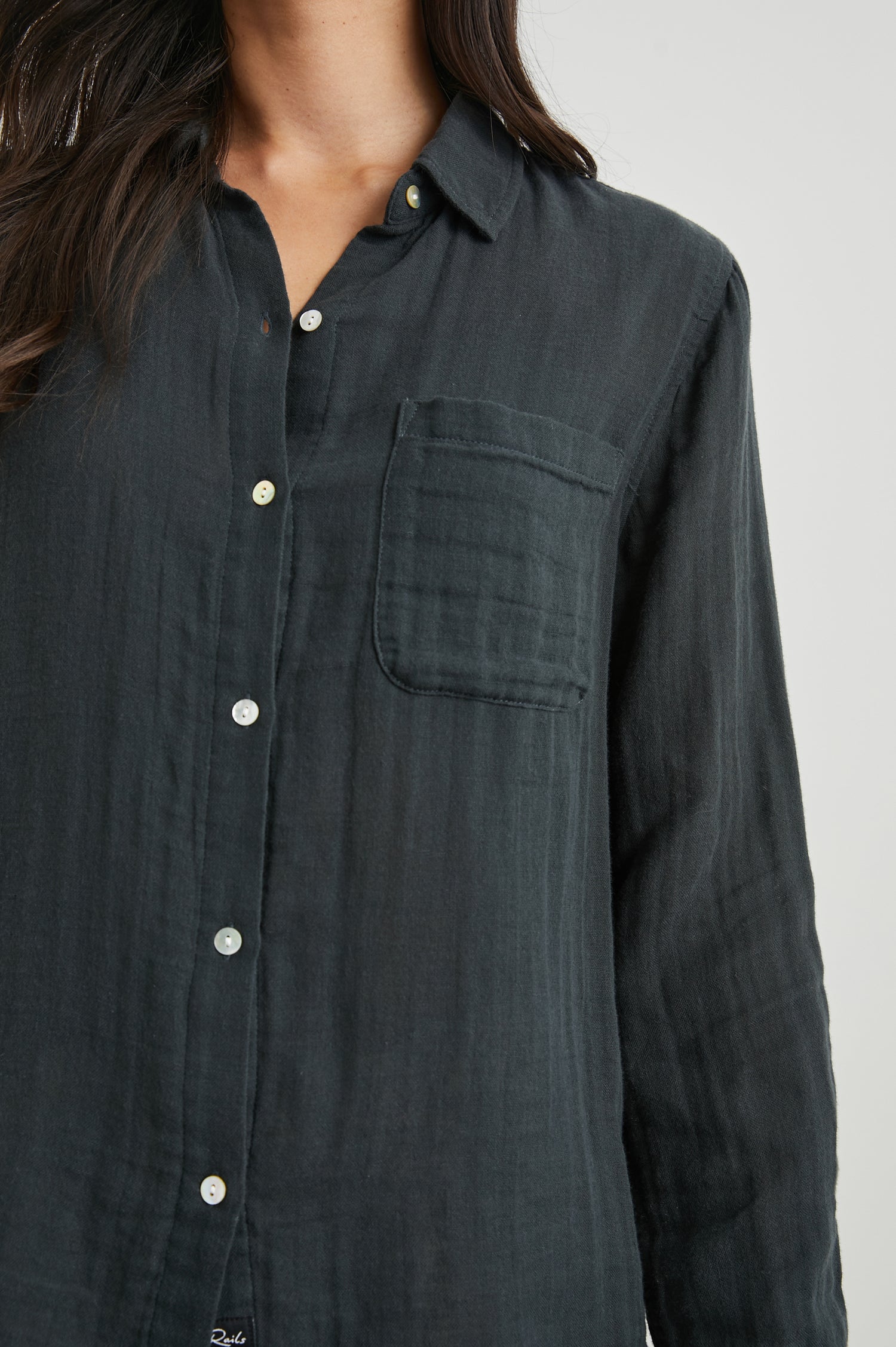 Ellis Long-Sleeve Button Down with Cuffs and a Patch Chest Pocket in Washed Black Colorway - Front View Featured on Model