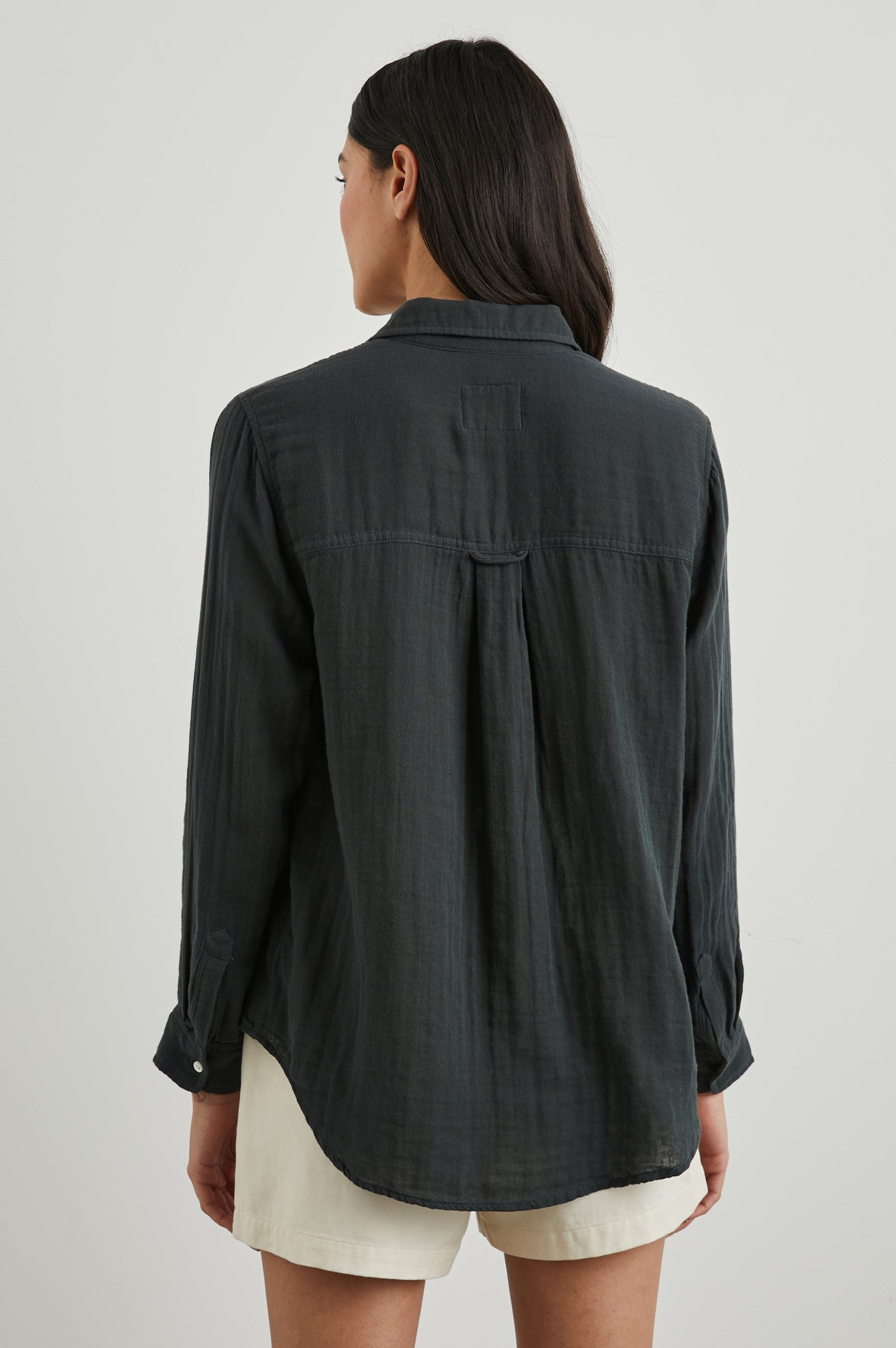 Ellis Long-Sleeve Button Down with Cuffs and a Patch Chest Pocket in Washed Black Colorway - Back View Featured on Model