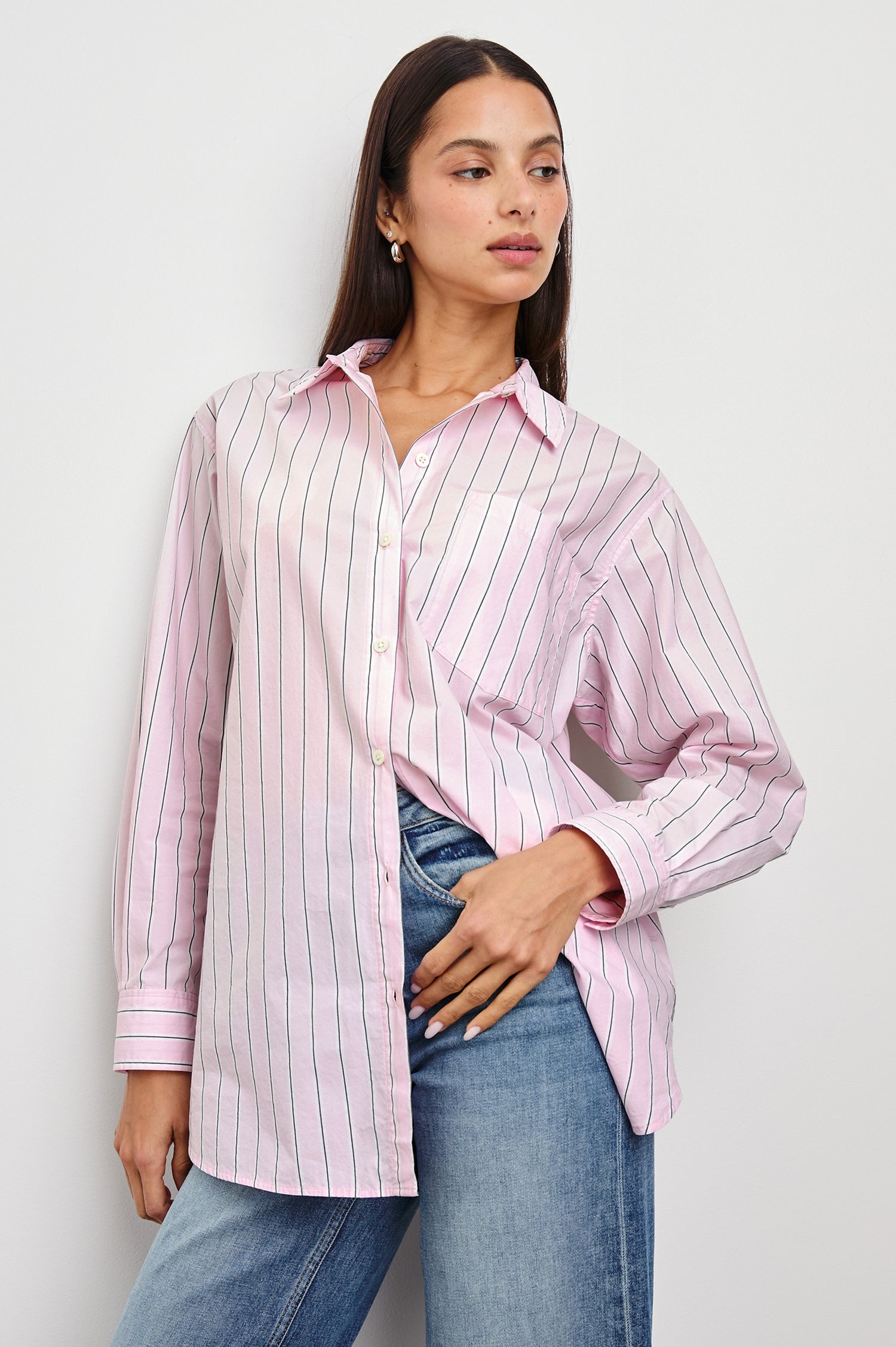 Elsa Long-Sleeve Button Down Shirt with Chest Patch Pocket in Cherry Blossom Stripe Colorway, Thin Black and White Vertical Stripes on Pink- Front Untucked View Featured on Model