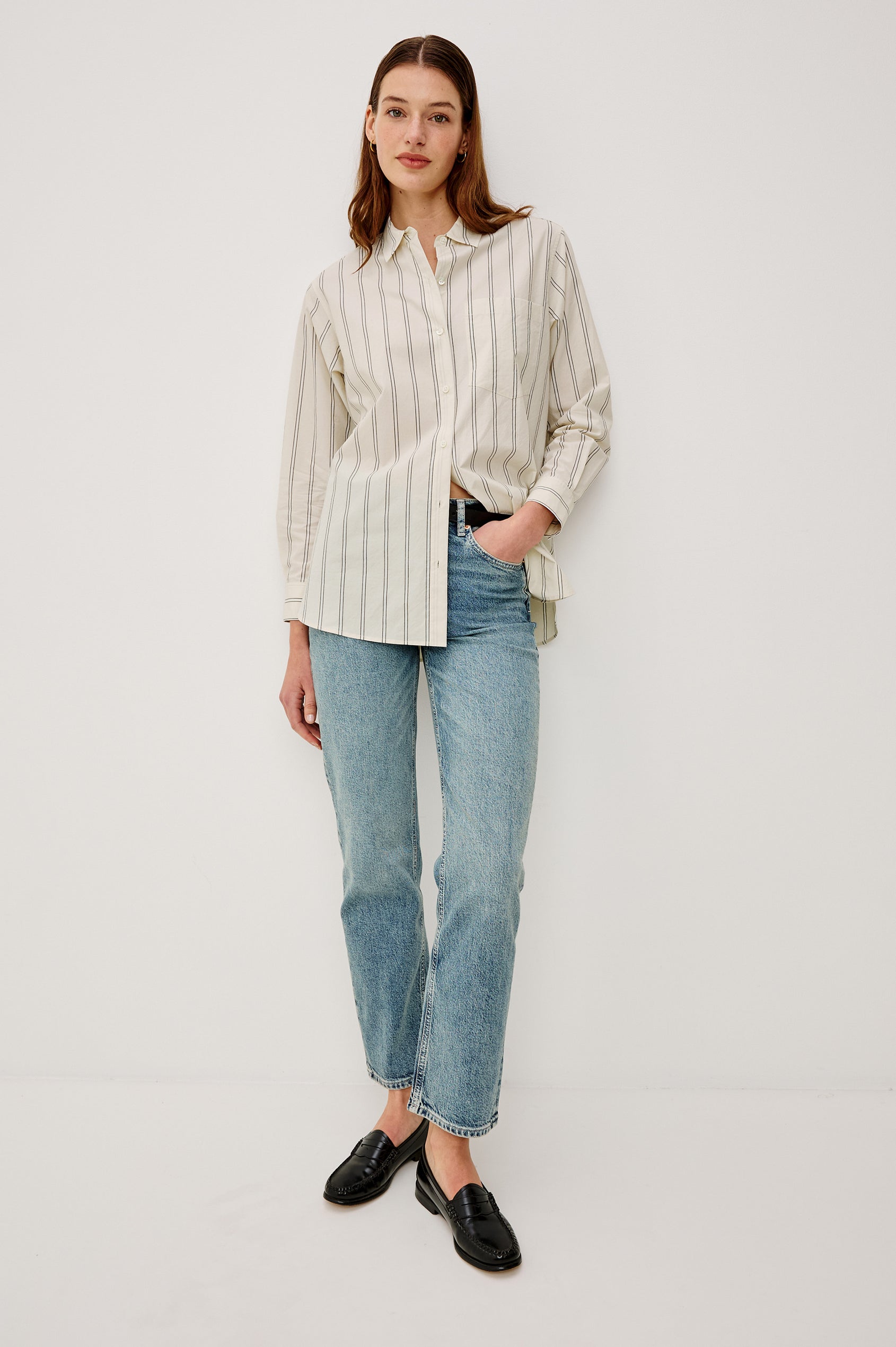 Elsa Button-Up Shirt in Cotton Poplin With Relaxed Oversized Fit Classic Chest Pocket Long Sleeves and Curved Hem in Palma Stripe Colorway - Full Body Front View Featured on Model
