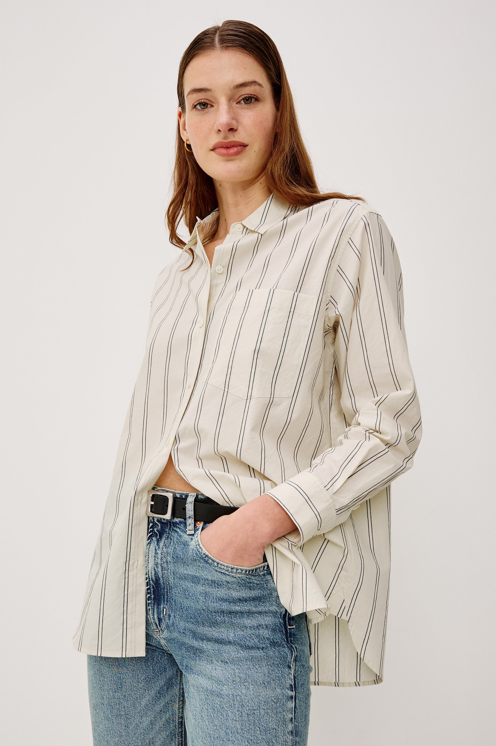 Elsa Button-Up Shirt in Cotton Poplin With Relaxed Oversized Fit Classic Chest Pocket Long Sleeves and Curved Hem in Palma Stripe Colorway - Upper Body Front View Featured on Model