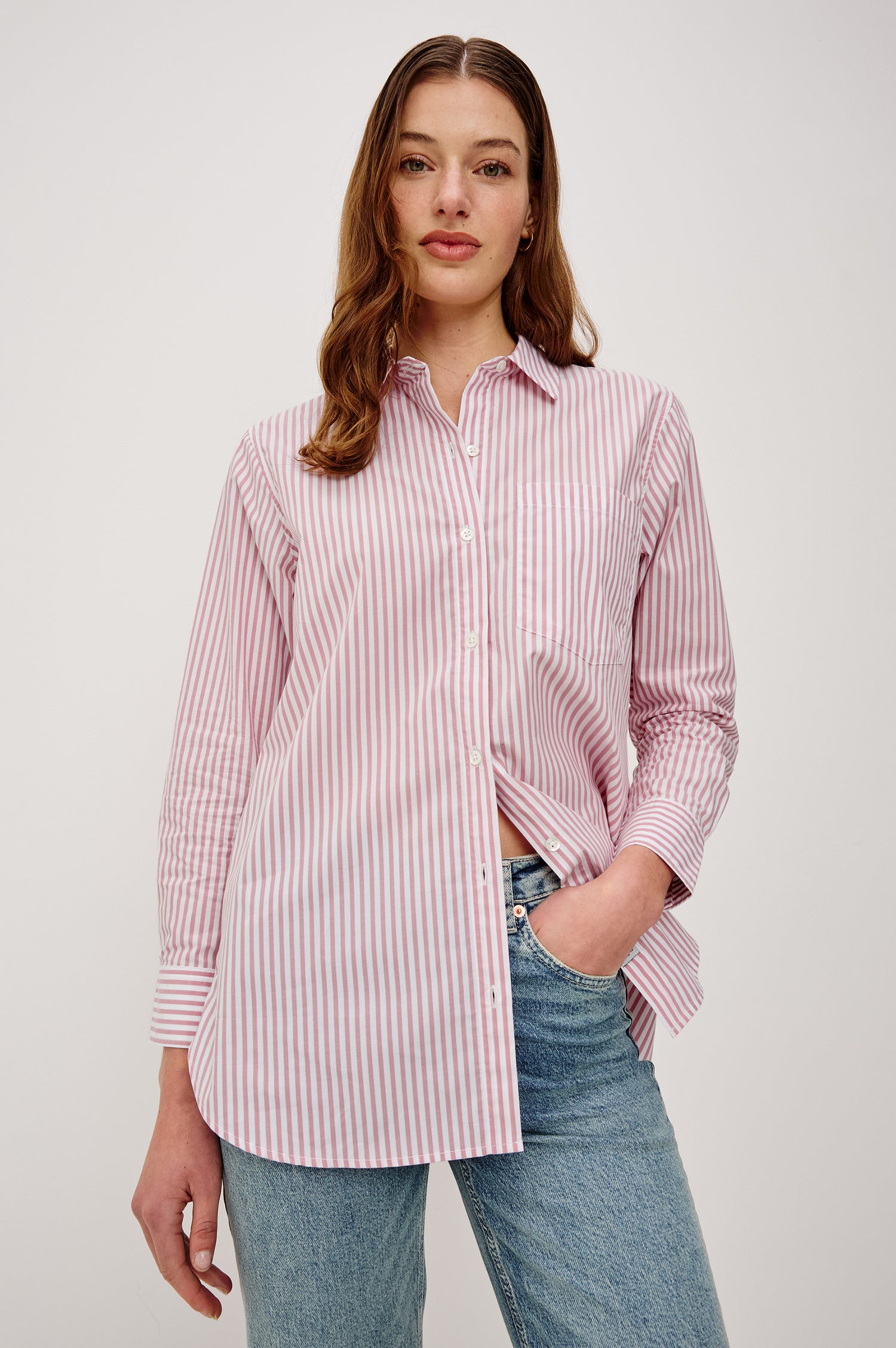 Elsa Button-Up Shirt in Cotton Poplin With Relaxed Oversized Fit Classic Chest Pocket Long Sleeves and Curved Hem in Rose Stripe Colorway - Upper Body Front View Featured on Model