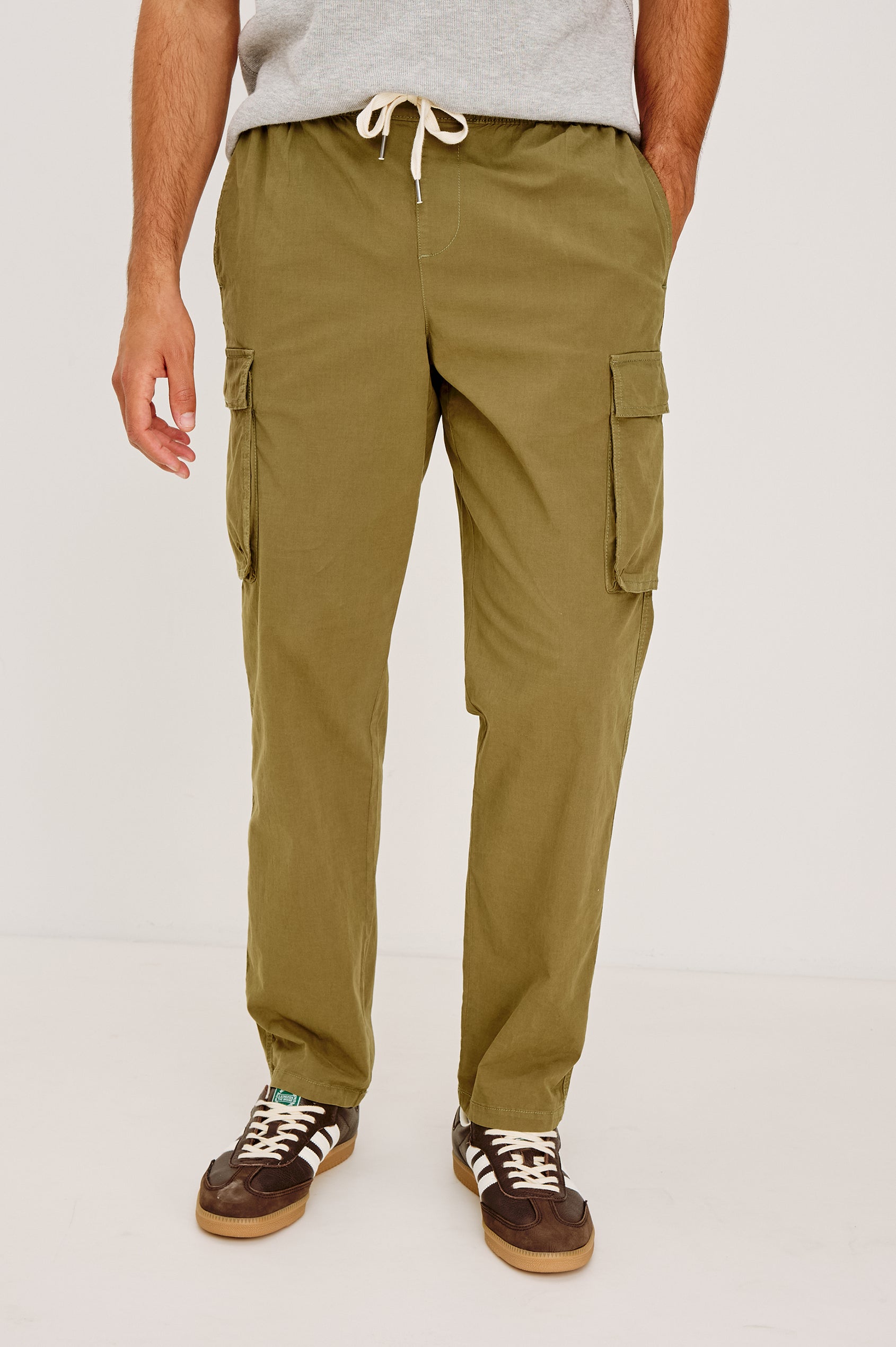 Emmerson Pant in Lightweight Cotton With Cargo Pockets and Drawstring Waist in Olive Colorway - Lower Body Front View Featured on Model