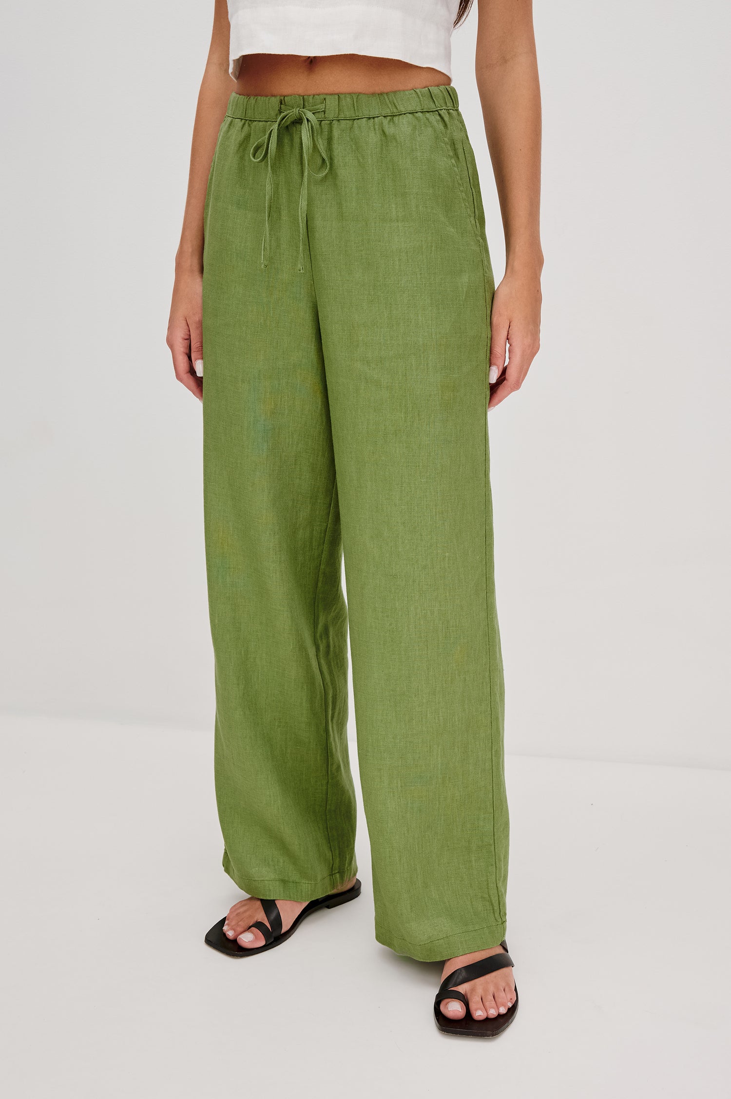 Emmie high rise linen wide leg pant with drawstring in Dill colorway- front view on model.
