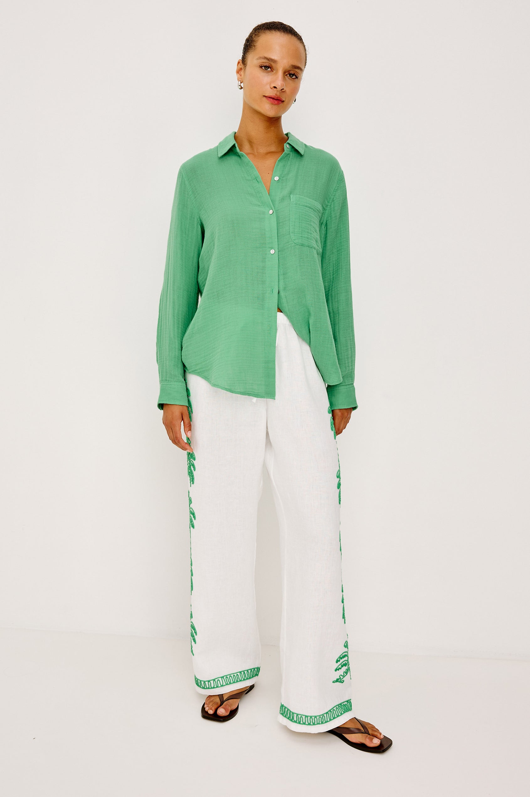 Emmie Straight Leg Pant in Unlined Linen With Adjustable Drawstring Waist Ties and Side Pockets in Emerald Palms Embroidery Colorway — Lower Body Back View Featured on Model