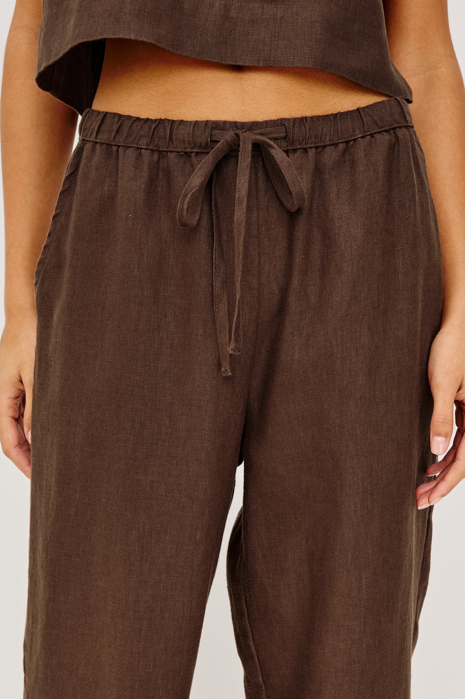 Emmie Straight Leg Pant in Linen With Adjustable Drawstring Waist Ties â€” Lower Body Front View Featured on Model