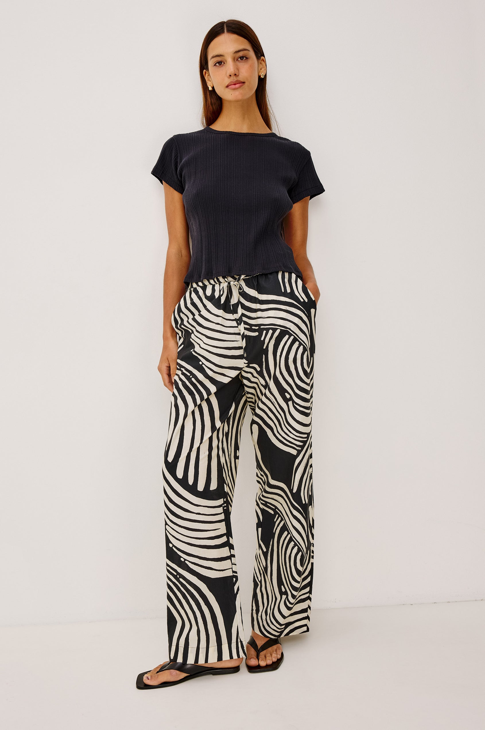 Emmie Pant in Cotton Voile With Straight Legs, Adjustable Drawstring Waist Ties, and Side Pockets in Onyx Waves Colorway - Full Body Front View Featured on Model
