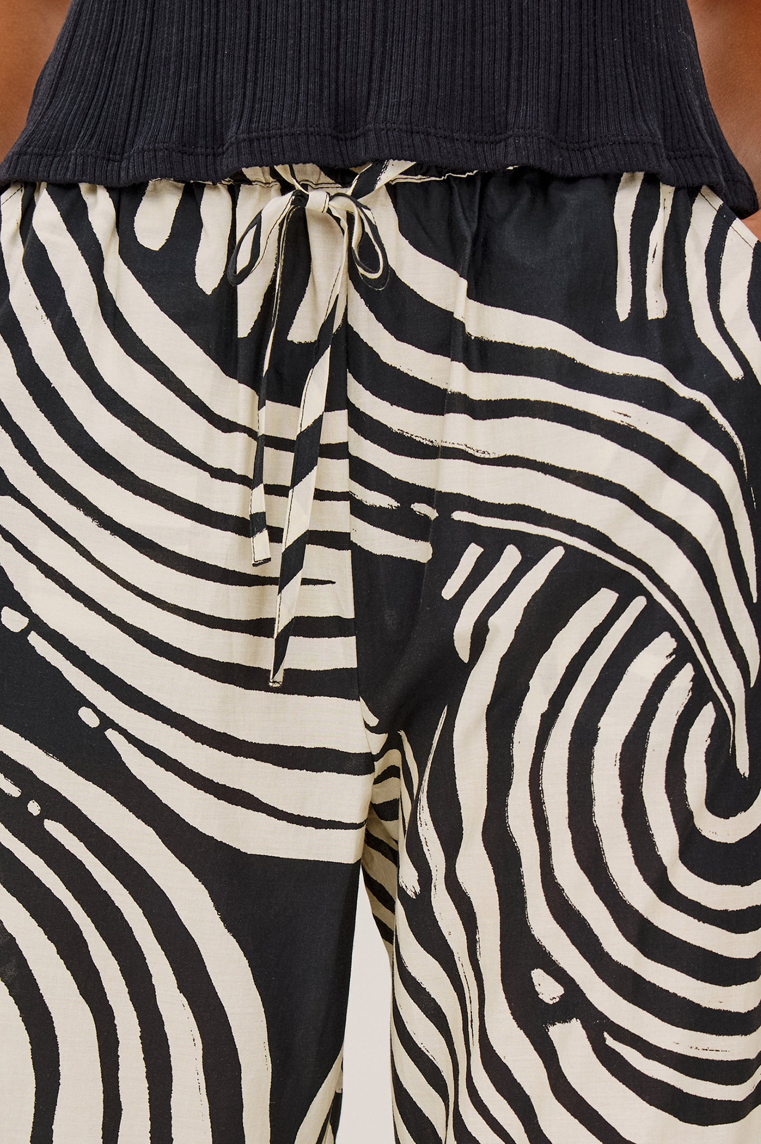 Emmie Pant in Cotton Voile With Straight Legs, Adjustable Drawstring Waist Ties, and Side Pockets in Onyx Waves Colorway - Lower Body Front View Featured on Model