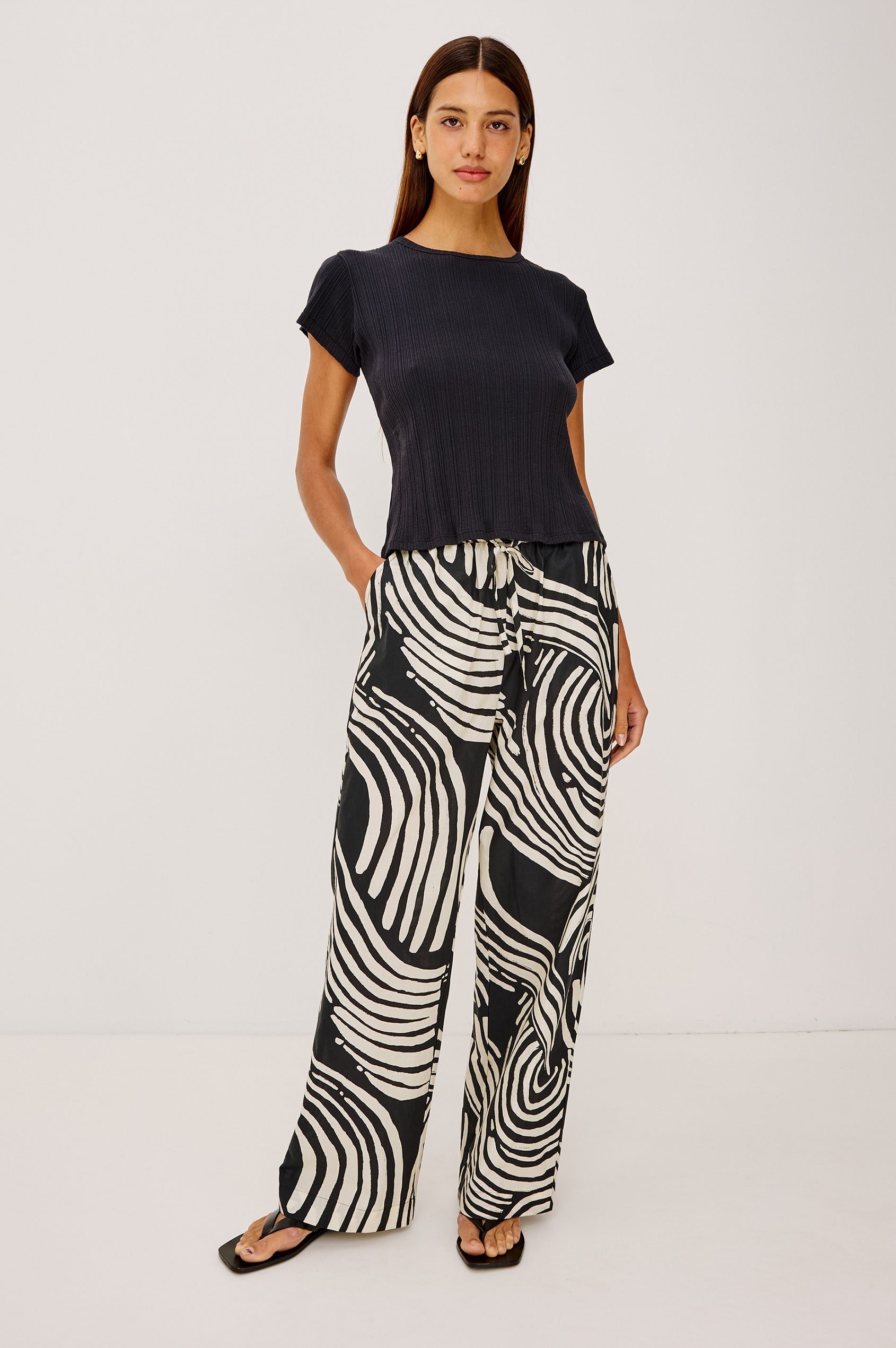Emmie Pant in Cotton Voile With Straight Legs, Adjustable Drawstring Waist Ties, and Side Pockets in Onyx Waves Colorway - Full Body Front View Featured on Model