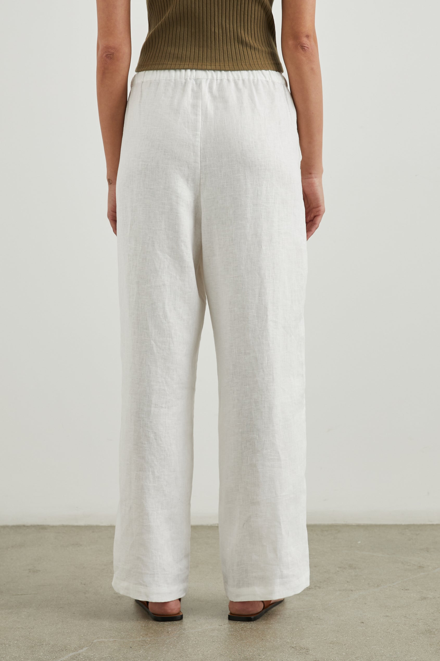 Emmie Pants with a Drawstring Waist and Two Front Pockets in White Colorway - Back View Featured on Model