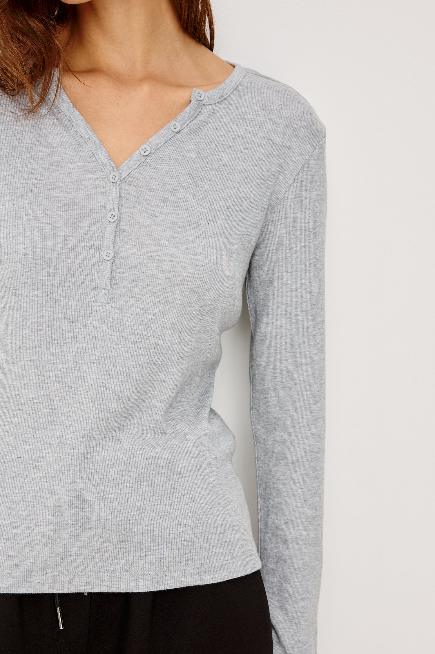 Essential Long-Sleeve Finely Ribbed Henley, with a V Neck and a Placket with Buttons in Heather Grey Colorway - Front Detail View Featured on Model 