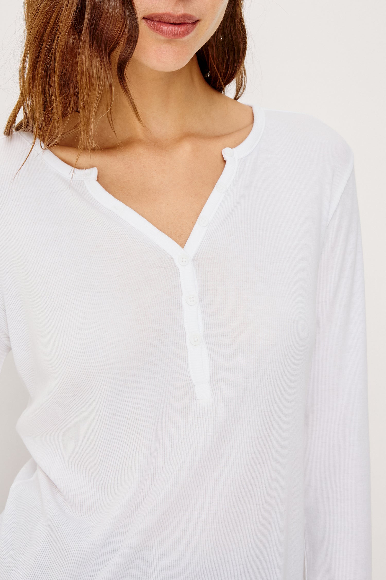Essential Ribbed Henley With Front Placket and Long Sleeves in White Colorway - Upper Body Close Up Front View Featured on Model