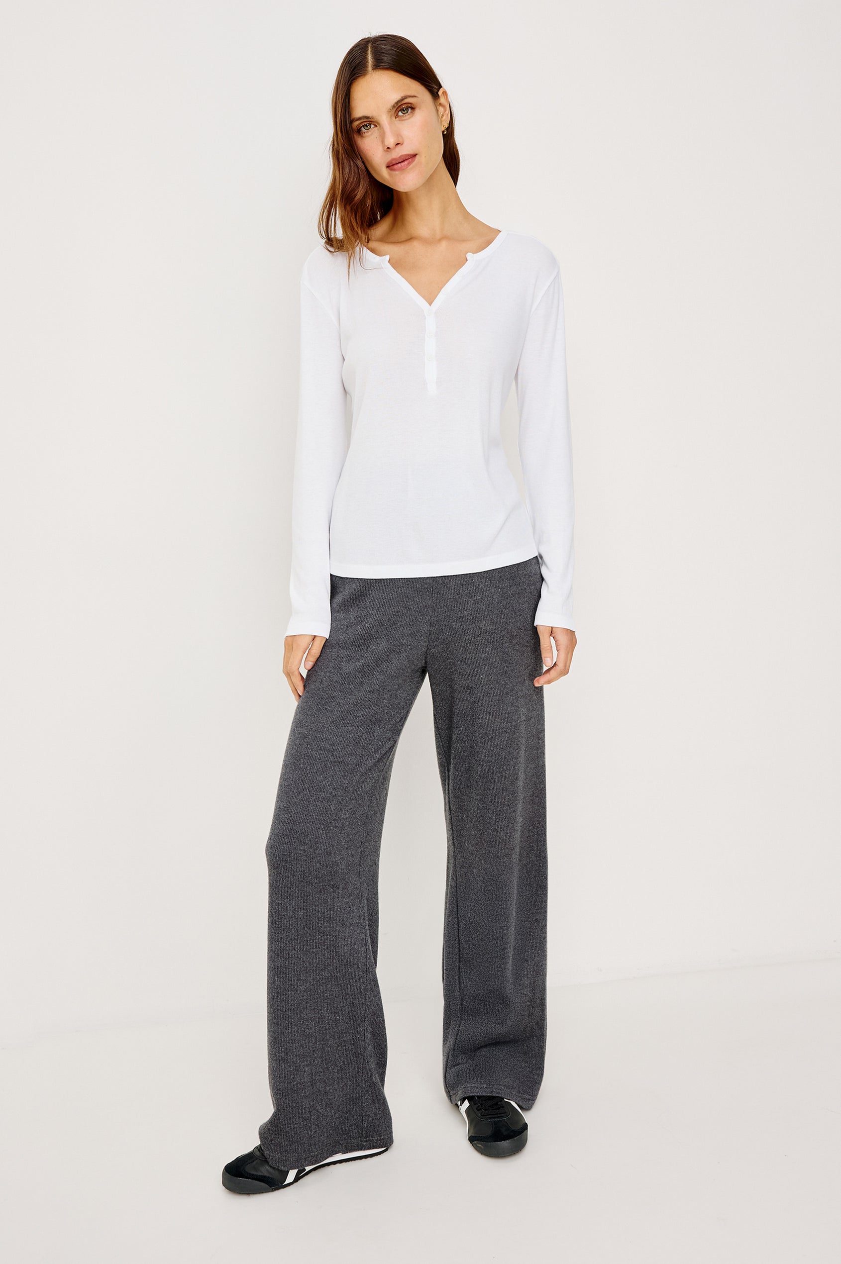 Essential Long-Sleeve Finely Ribbed Henley, with a V Neck and a Placket with Buttons in White Colorway - Front Full Body View Featured on Model 
