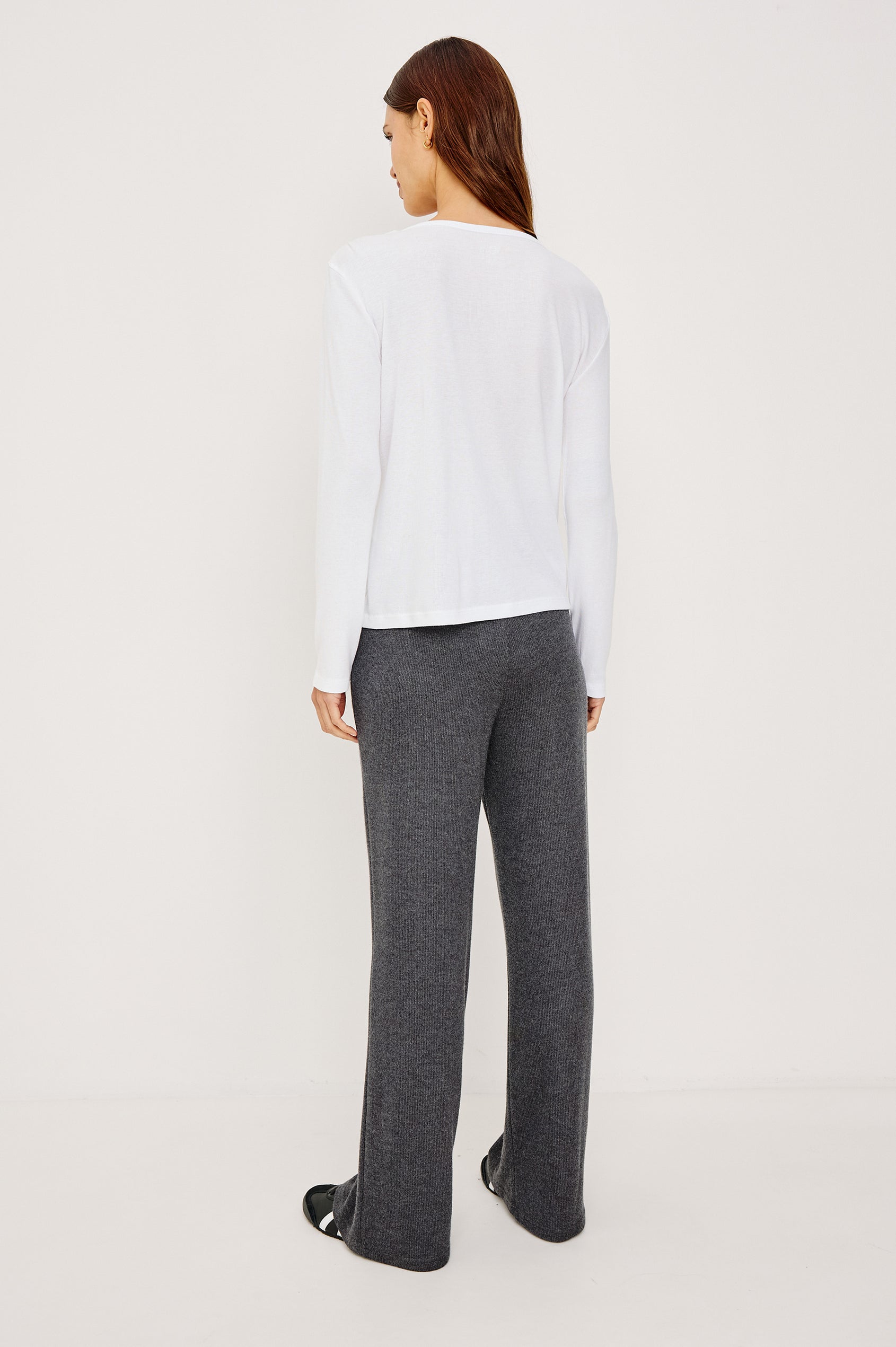 Essential Long-Sleeve Finely Ribbed Henley, with a V Neck and a Placket with Buttons in White Colorway - Back View Featured on Model 