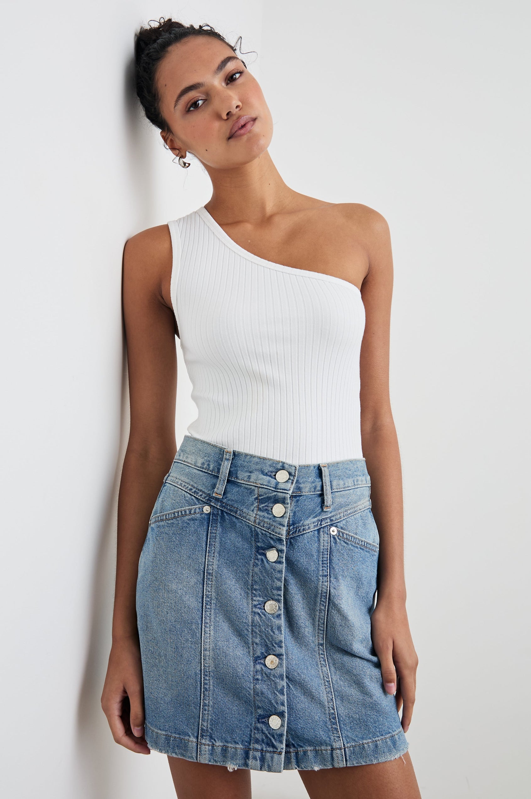 Esti Sleeveless Ribbed Top with an Asymmetrical Neckline with One Strap in White Colorway - Front Tucked View Featured on Model