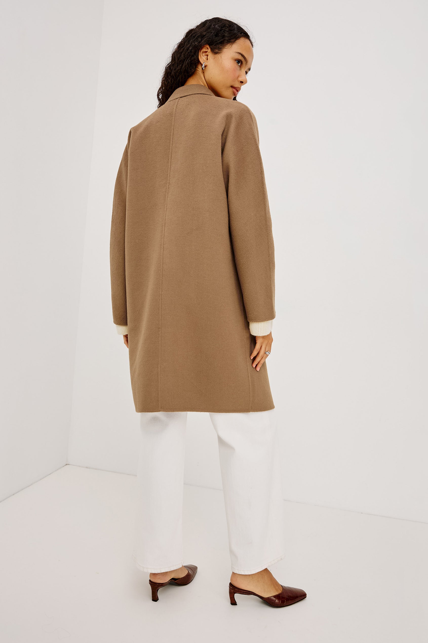 Everest Coat in Heavy Wool Blend With Longline Cut, Slightly Oversized Relaxed Fit, Lapel Collar, Single-Button Front, and Front Patch Pockets in Oat Camel Colorway - Full Body Back View Featured on Model