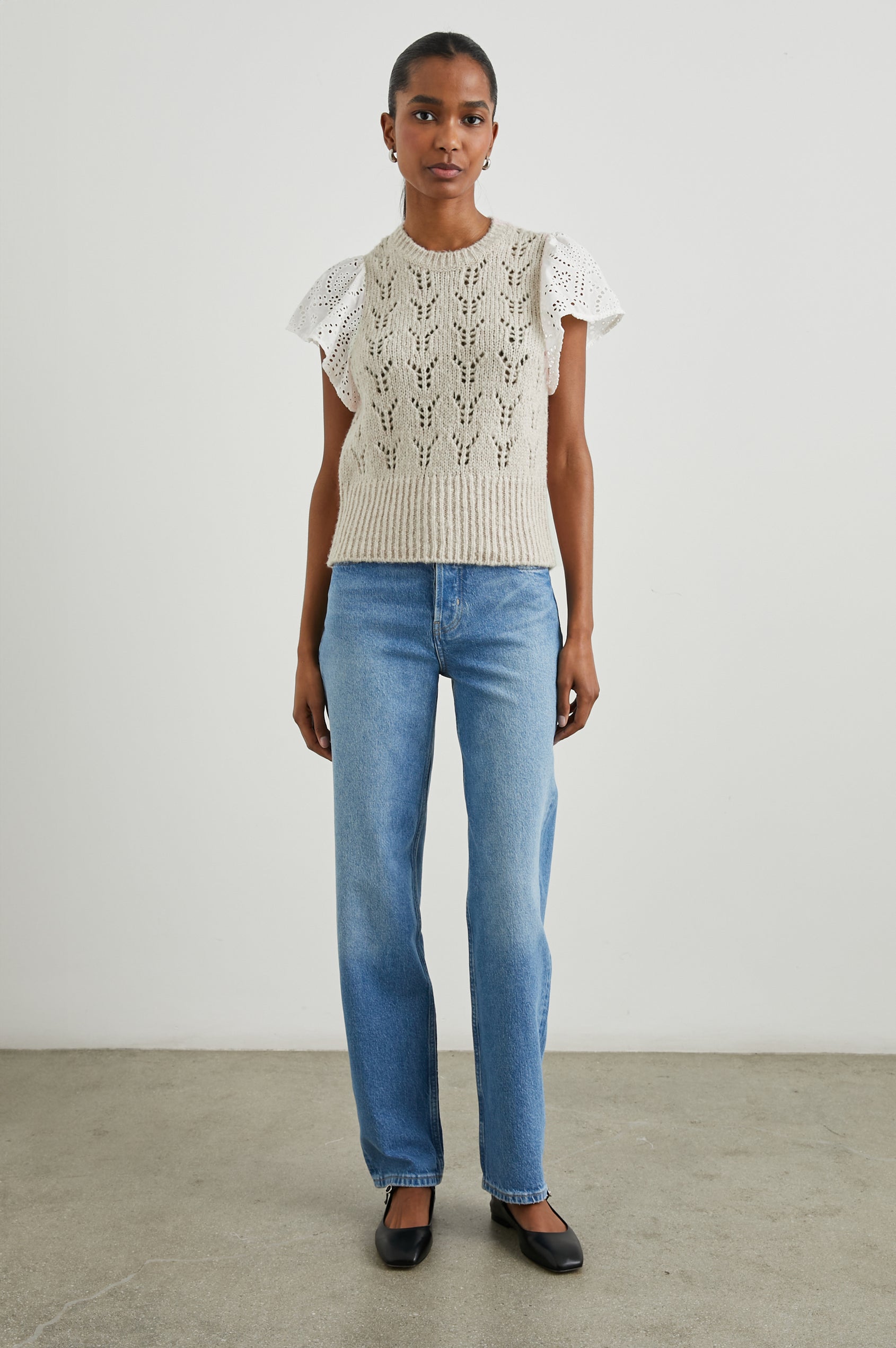Everly Top with a Knit Bodice with Ribbed Trim and a Crew Neck and White Cotton Short Sleeves with Eyelets In Oat Colorway - Front Full Body View Featured on Model