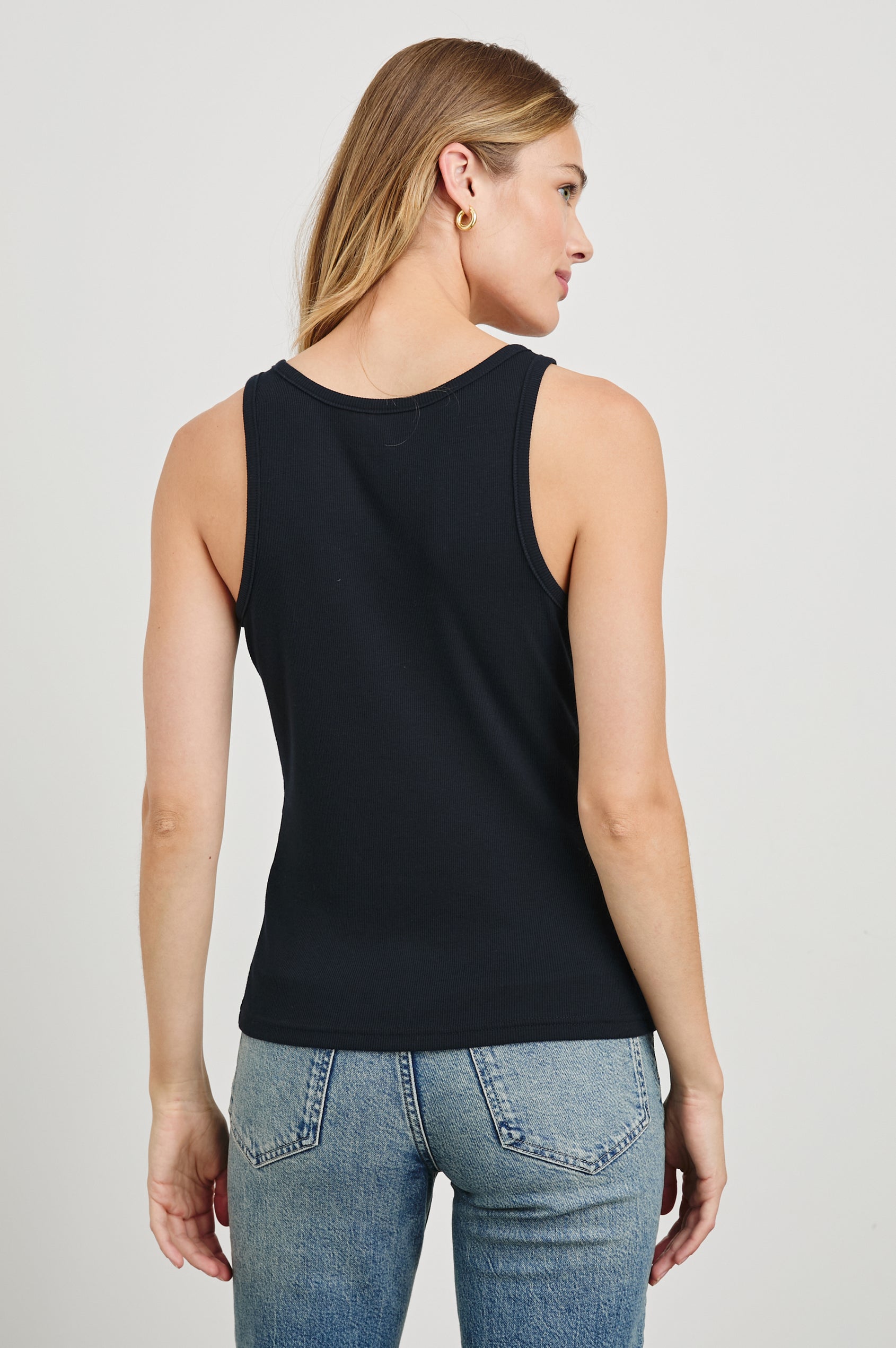 Everyday Tank with a Scoop Neck in Black Colorway - Back Tucked View Featured on Model