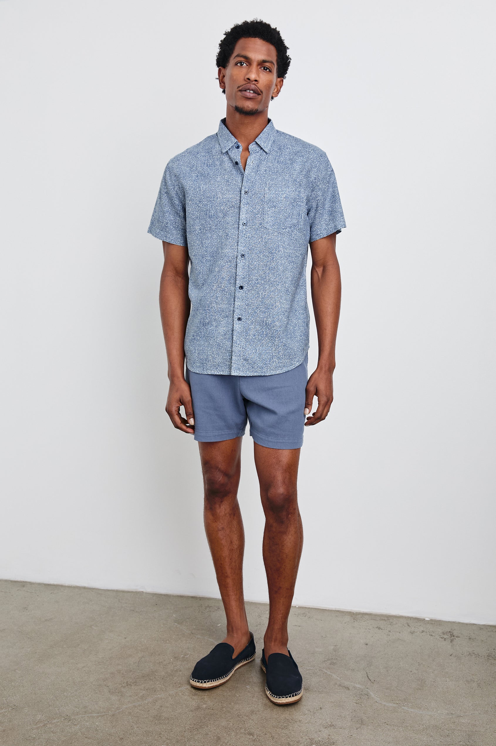 Fairfax short sleeve button up shirt with collar in Abstract Block Blue - full body front view on model