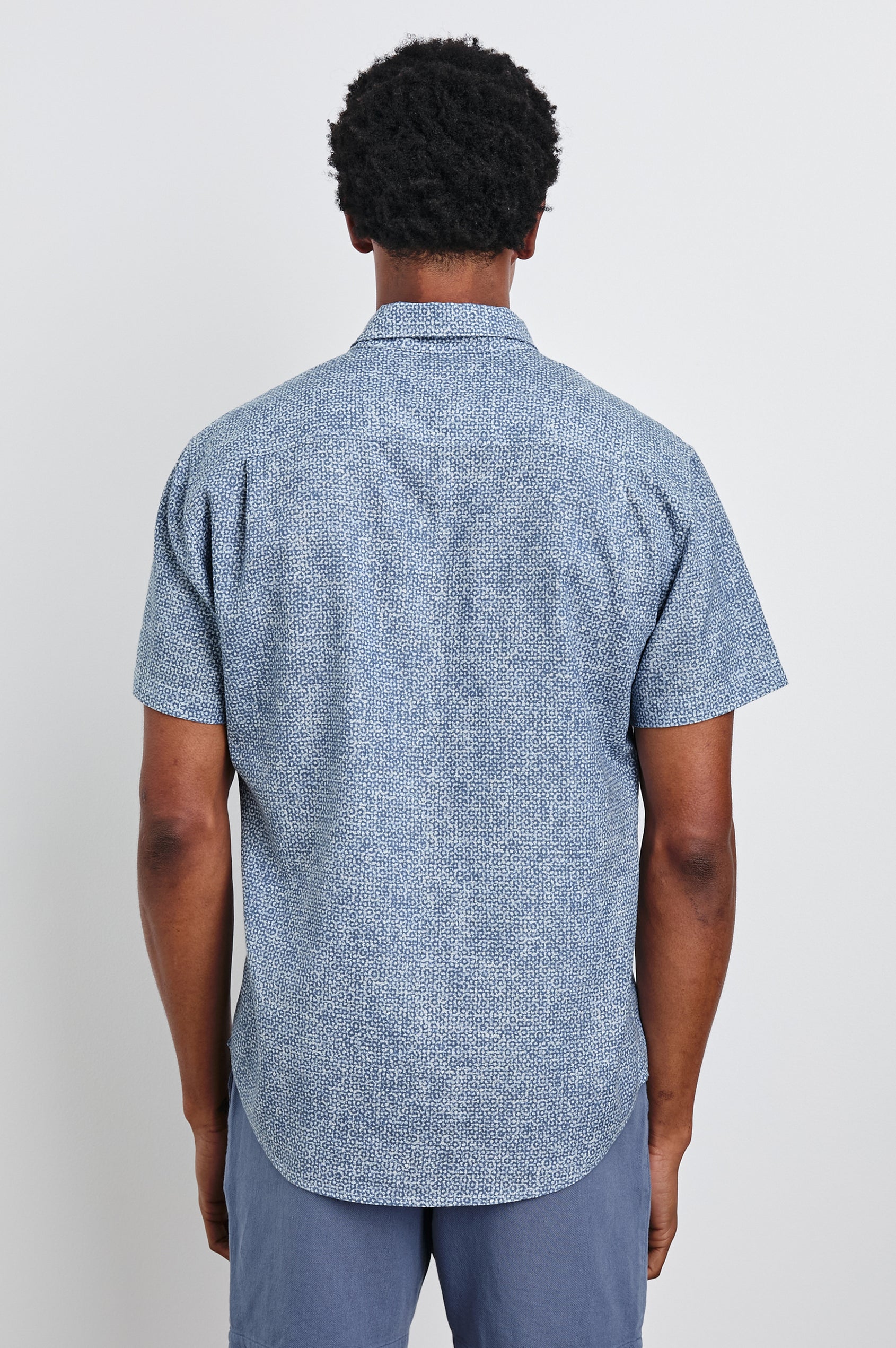 Fairfax short sleeve button up shirt with collar in Abstract Block Blue - back view on model