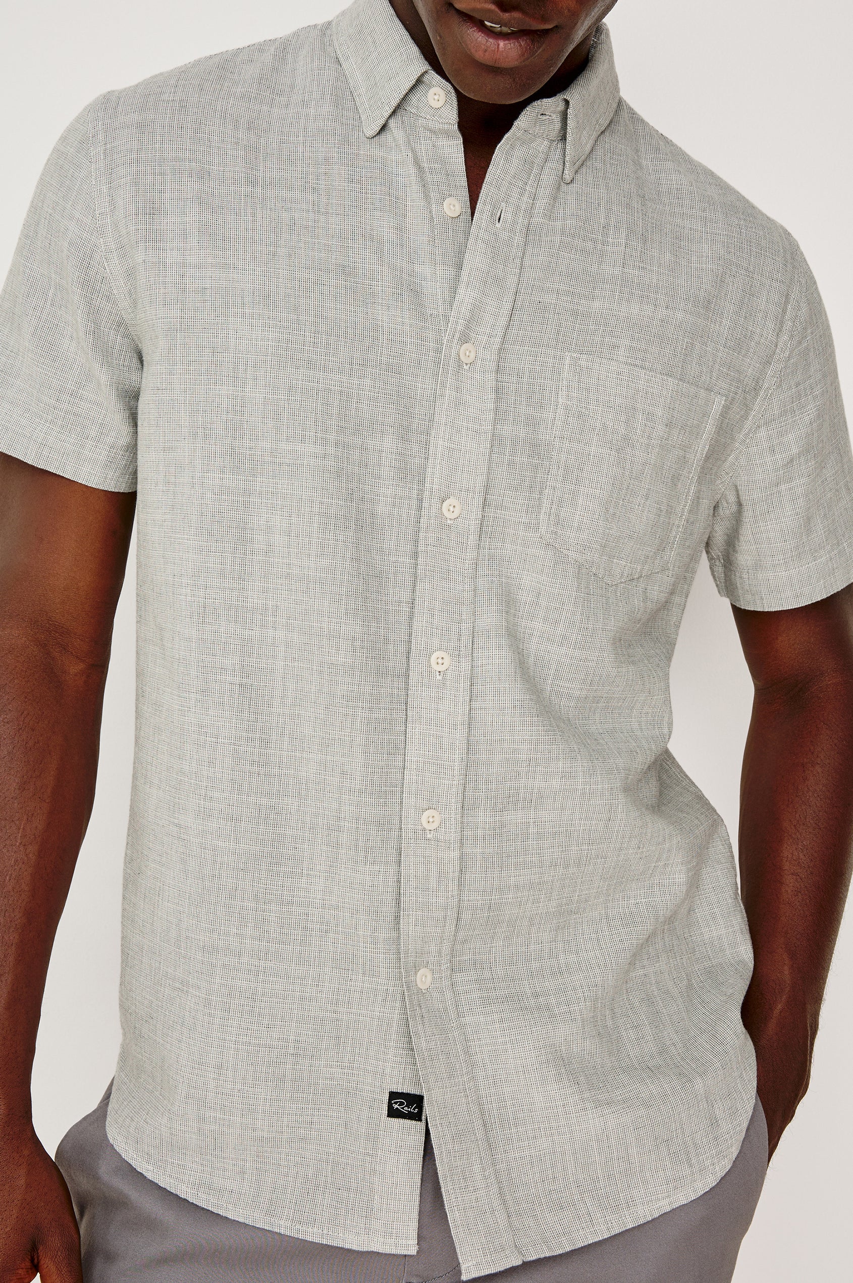 Fairfax Short Sleeve Button-Up Shirt in Lightweight Cotton With a Classic Fit in Platinum Etch Colorway - Upper Body Front Close Up View Featured on Model