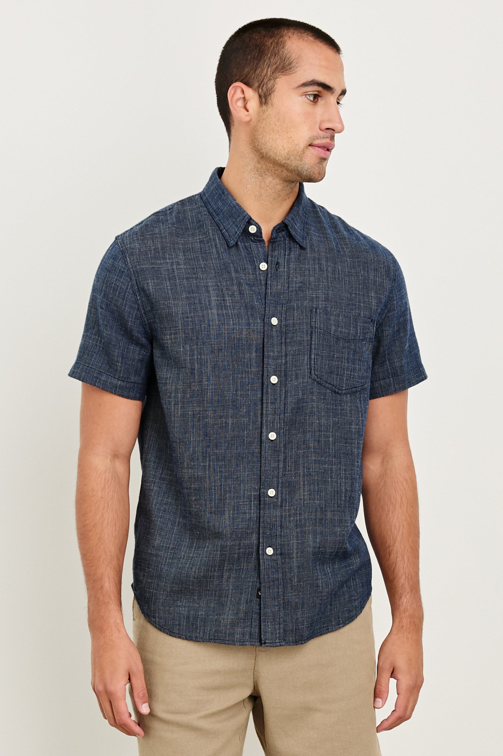 Fairfax short sleeve relaxed fit button up shirt with collar and chest pocket in Navy Etch - front view on model