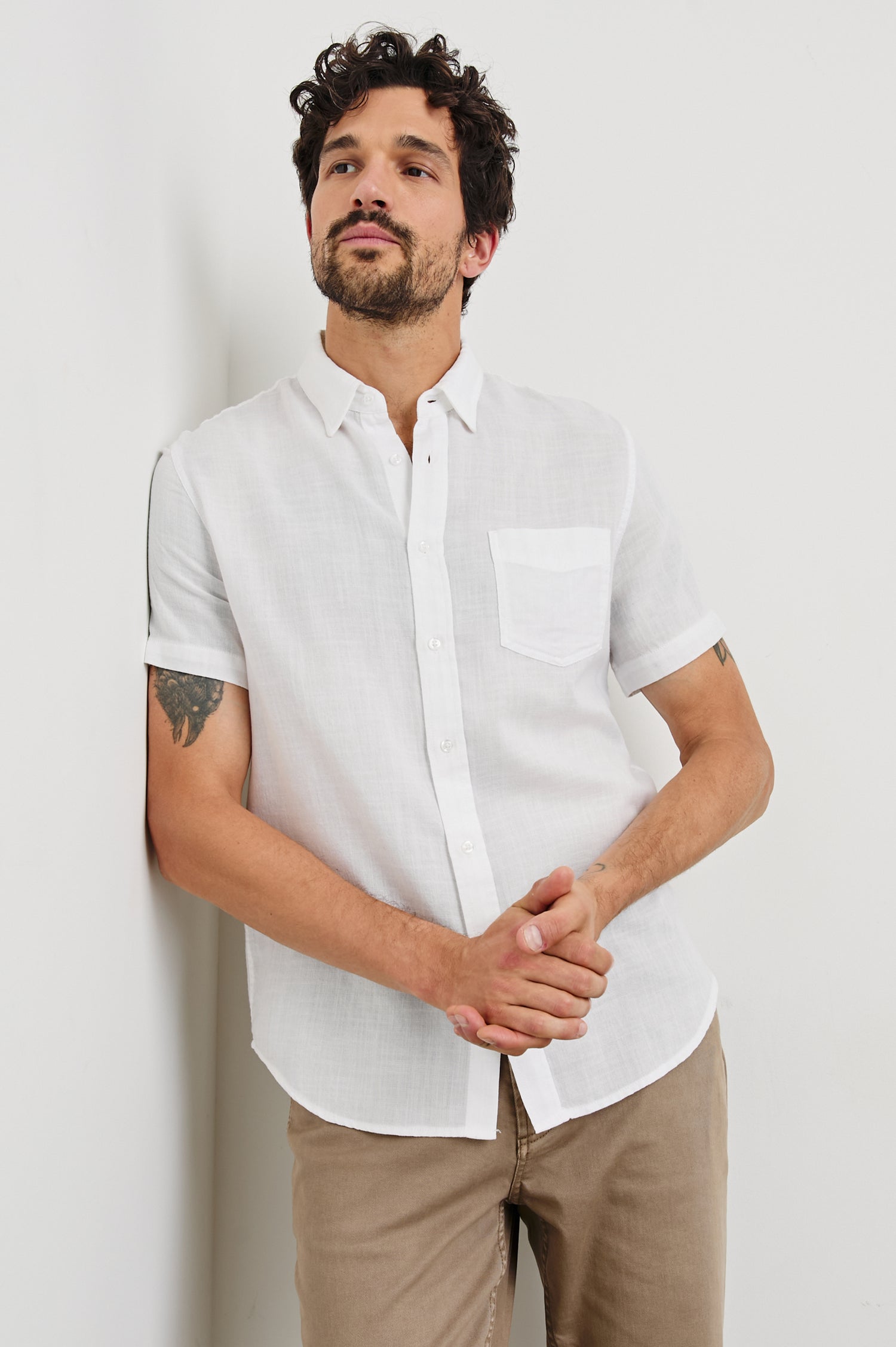 Fairfax short sleeve relaxed fit button up shirt with collar and chest pocket in White - front view on model