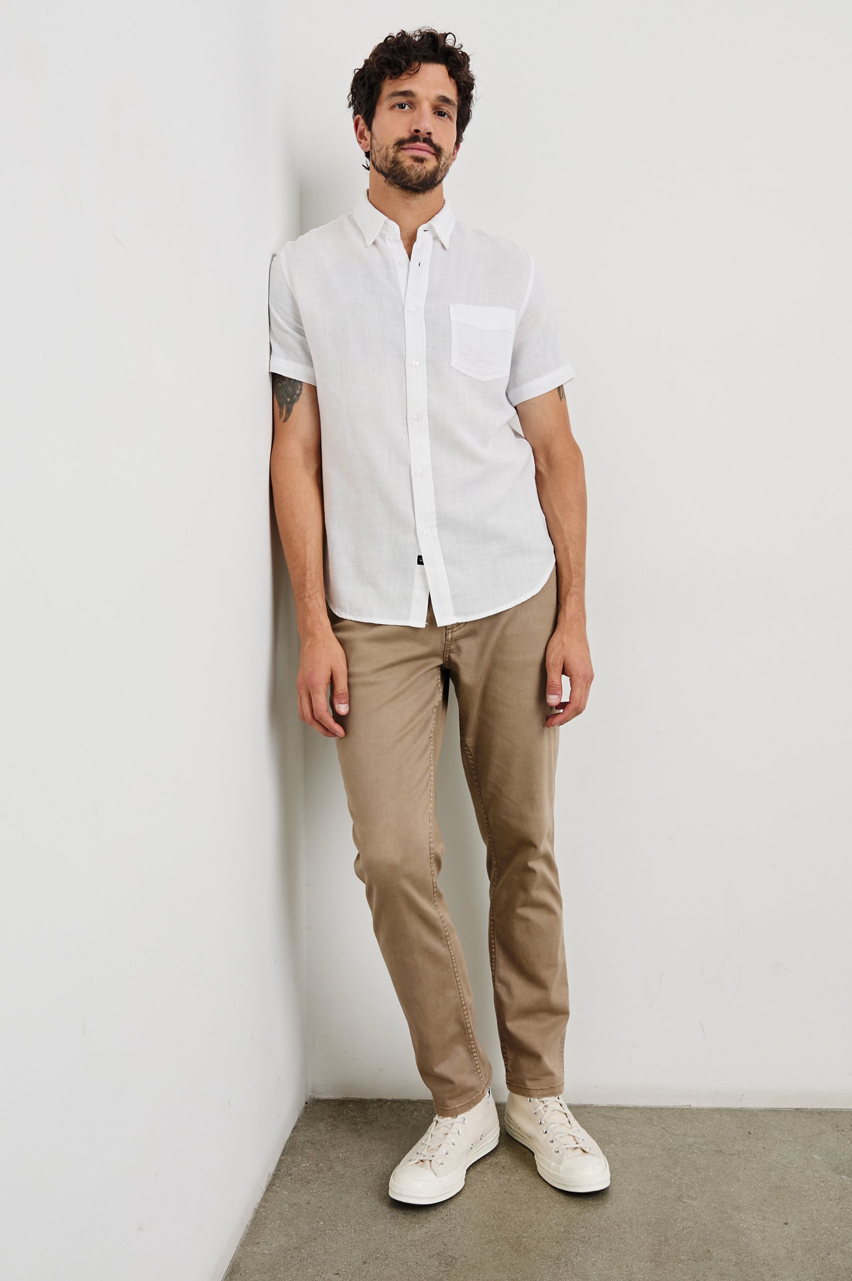 Fairfax short sleeve relaxed fit button up shirt with collar and chest pocket in White - full body front view on model