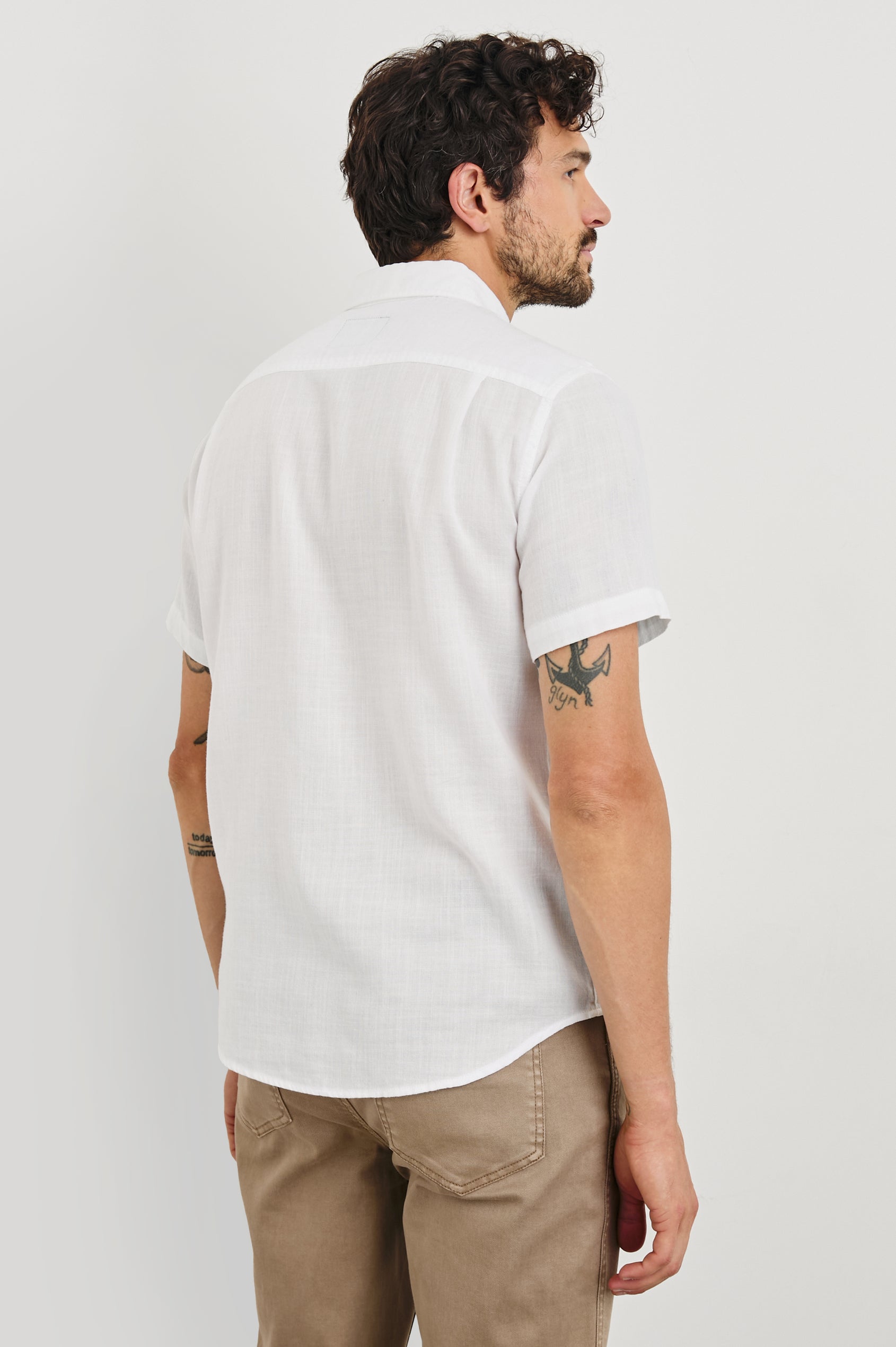 Fairfax short sleeve relaxed fit button up shirt with collar and chest pocket in White - back view on model