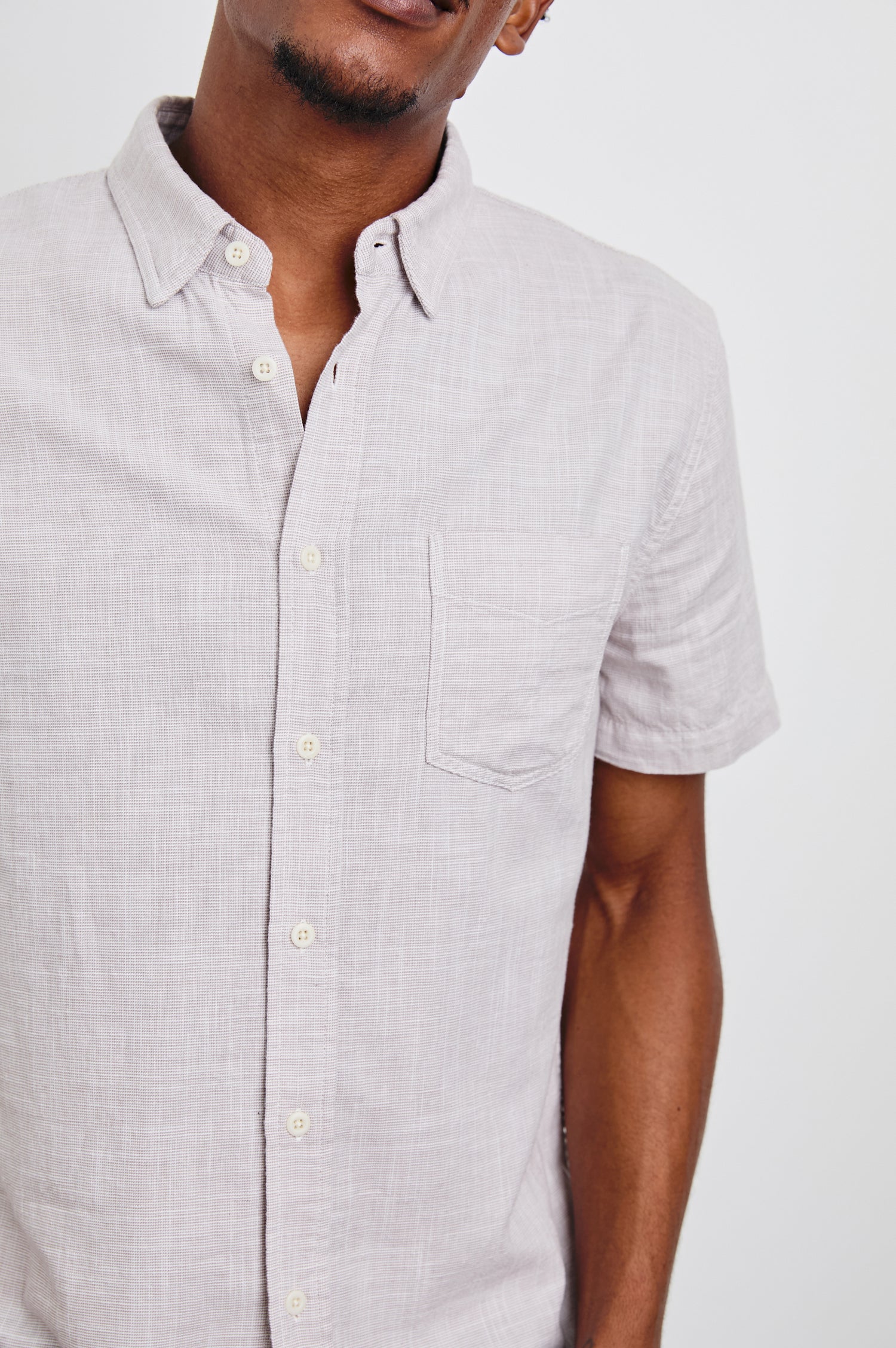 Fairfax Short-Sleeve Button Up with a Chest Patch Pocket in Tahini Etch Colorway - Front View Featured on Model