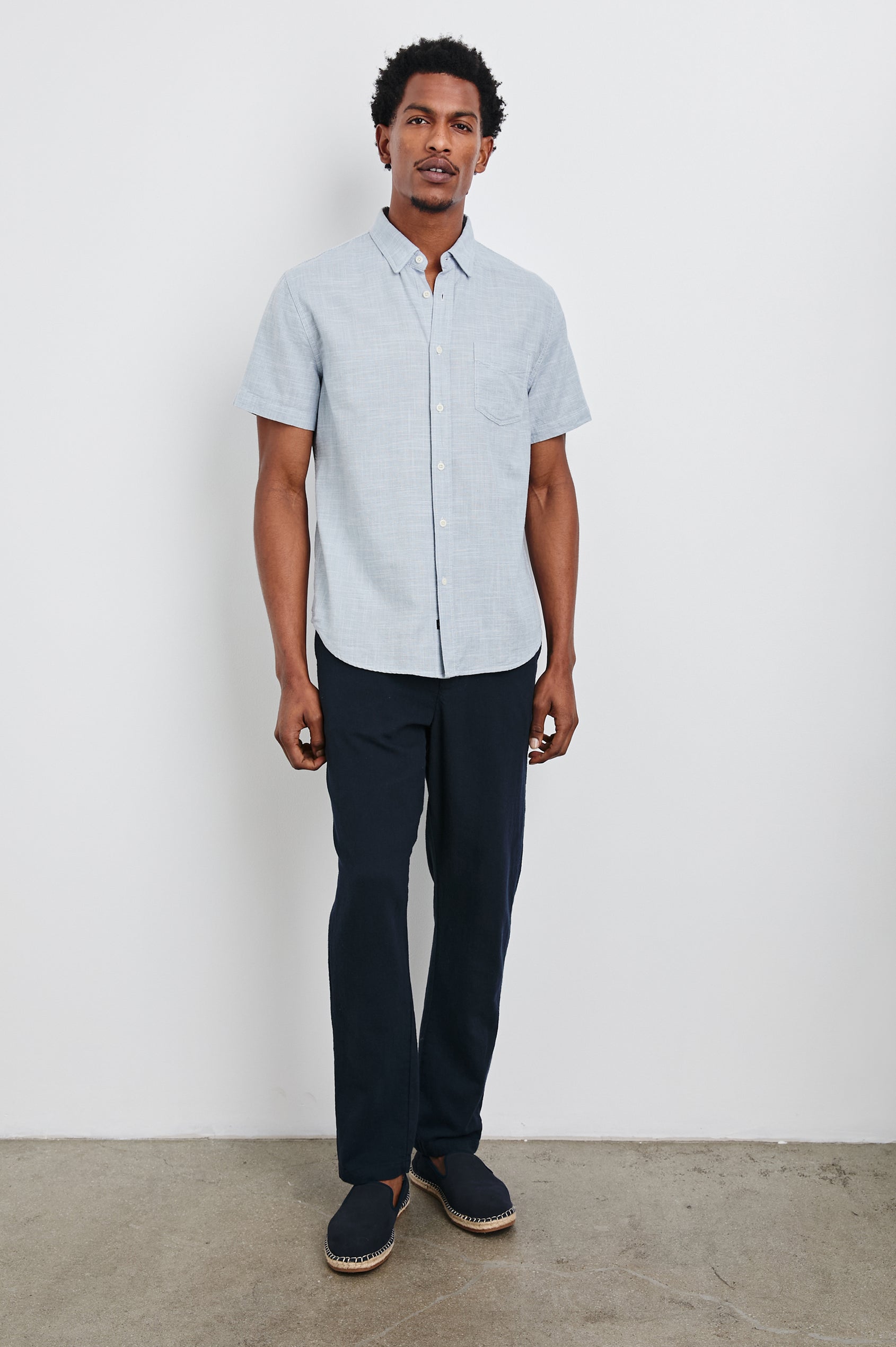 Fairfax Short-Sleeve Button Up with a Chest Patch Pocket in Tidal Etch Colorway - Front Full Body View Featured on Model