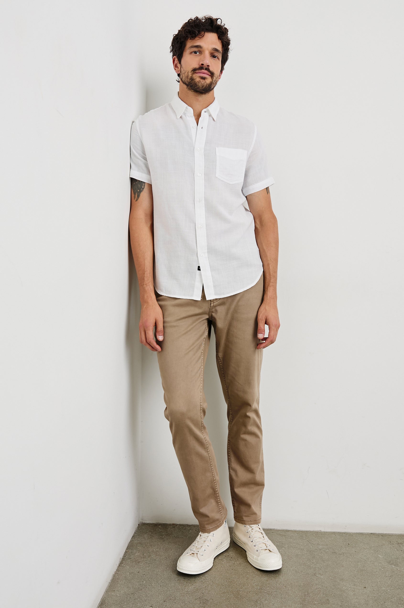Fairfax short sleeve button up shirt with collar and chest pocket in White - full body front view on model.
