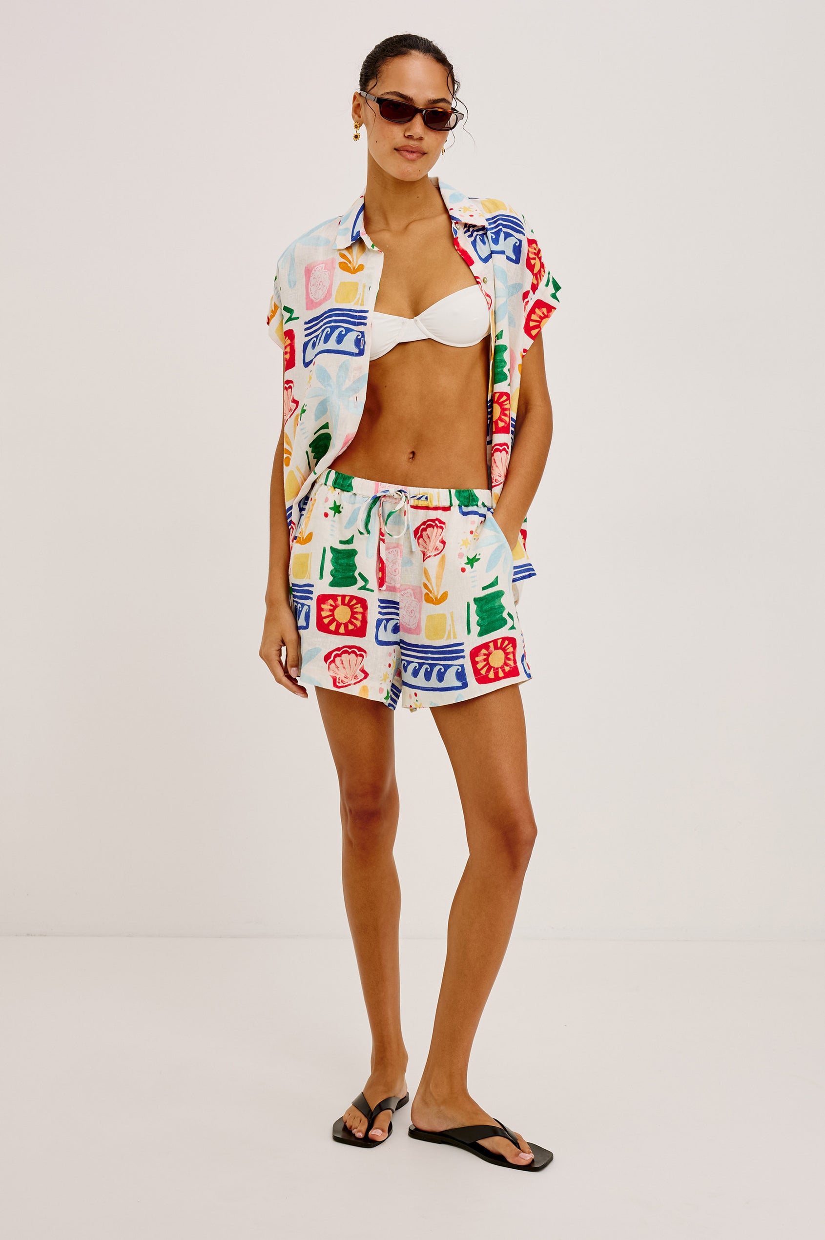 Farrah Button-Up Shirt in Featherweight Rayon With Collar, Short Rolled Sleeves, and Relaxed Fit in Spiral Shells Colorway - Upper Body Front View Featured on Model