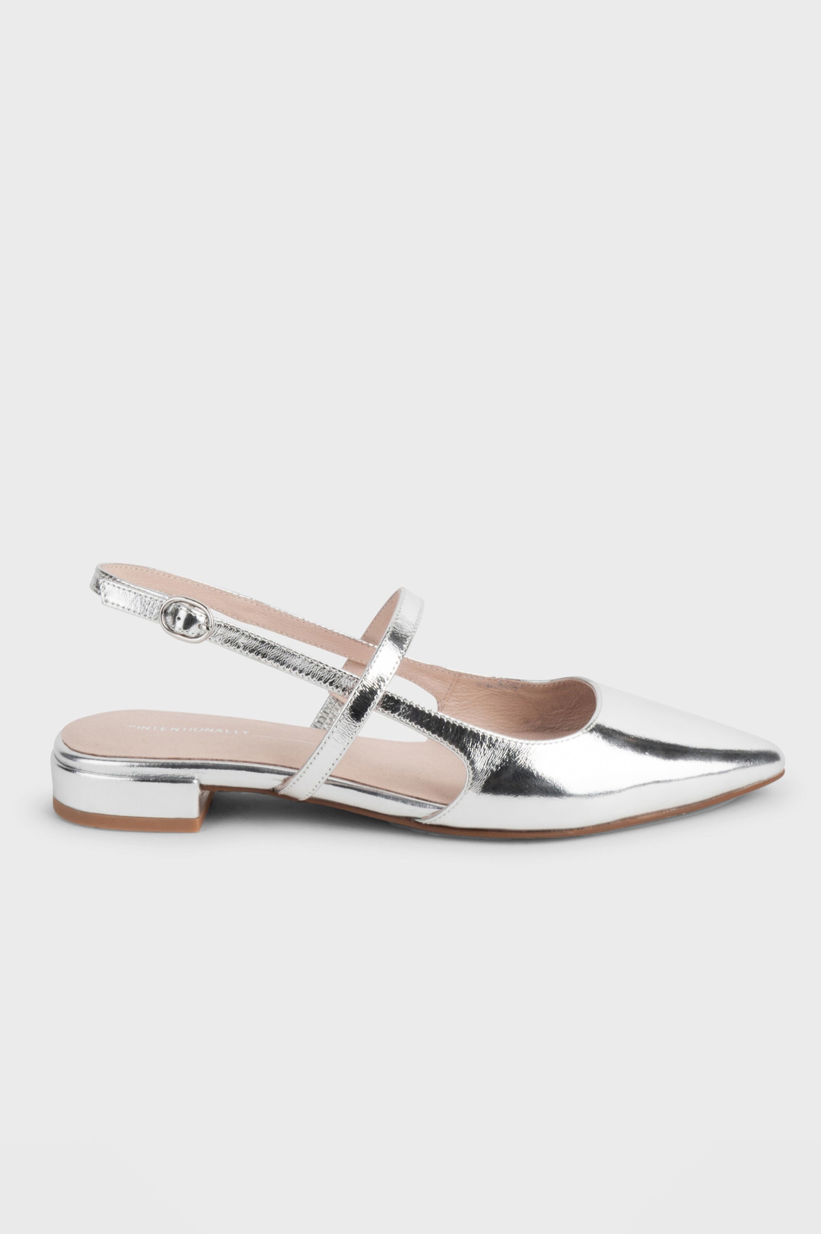 Felix slingback flat with pointed toe and mary jane style strap in metallic Mercury color - side angle of single shoe